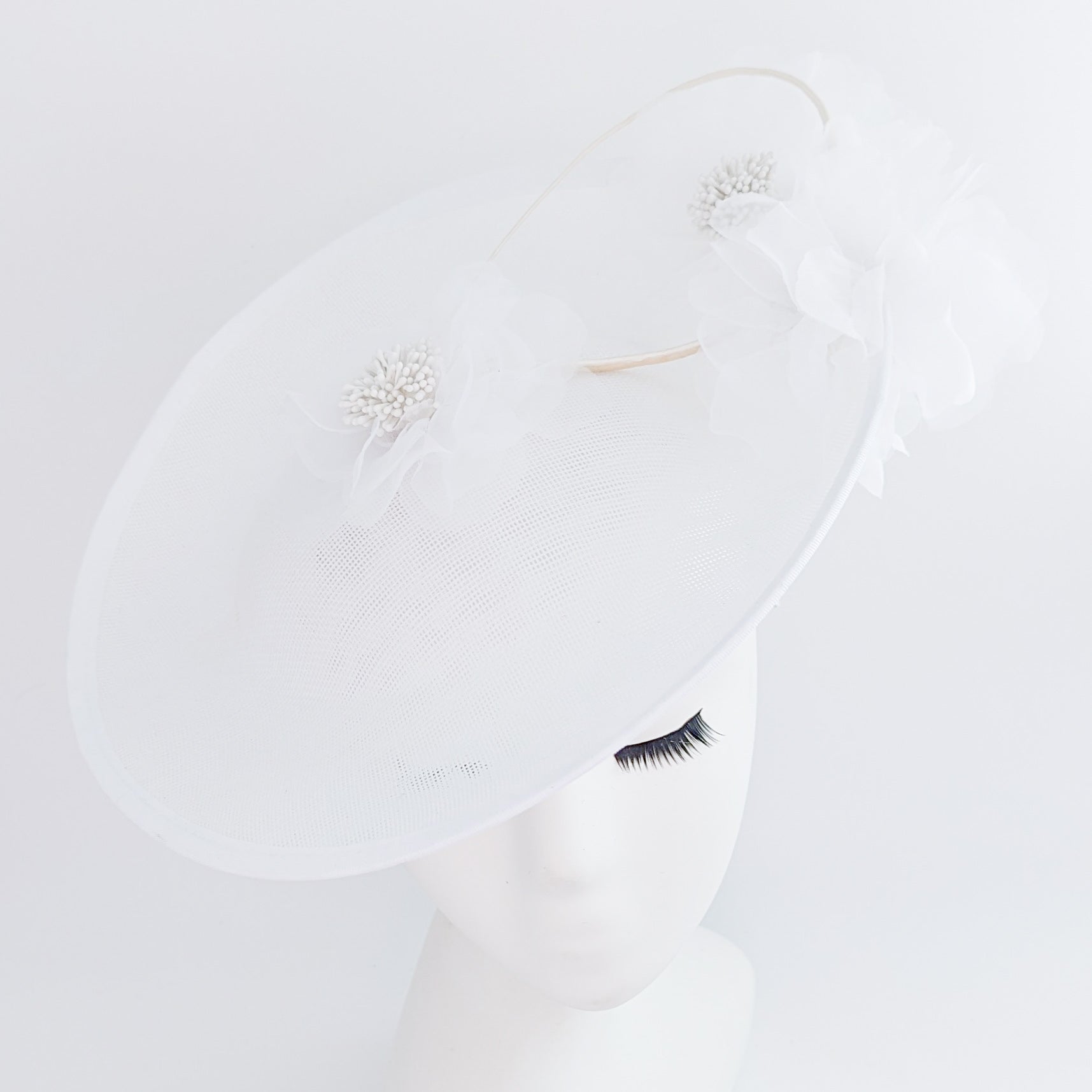 White large flower saucer disc fascinator hat