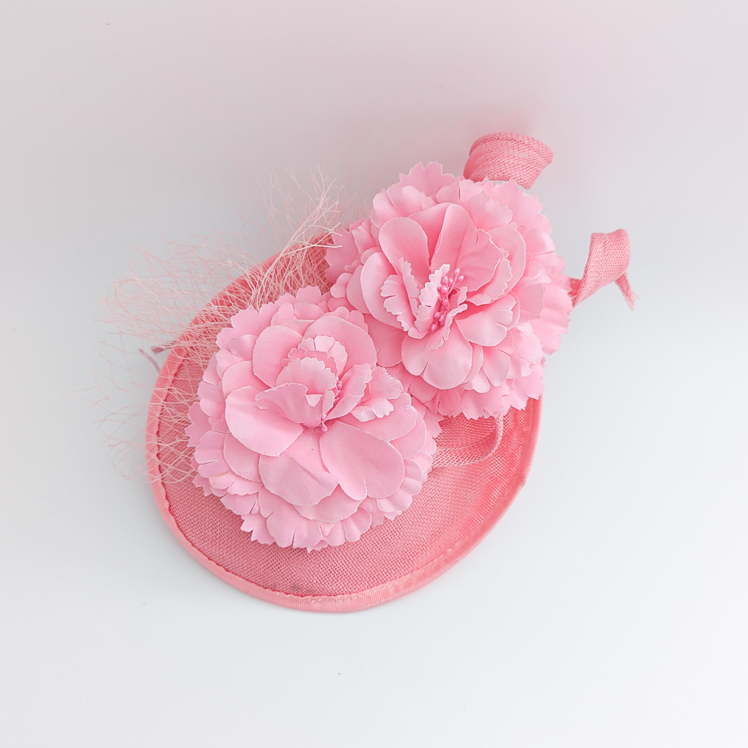 Pink flower fascinator disc saucer hat