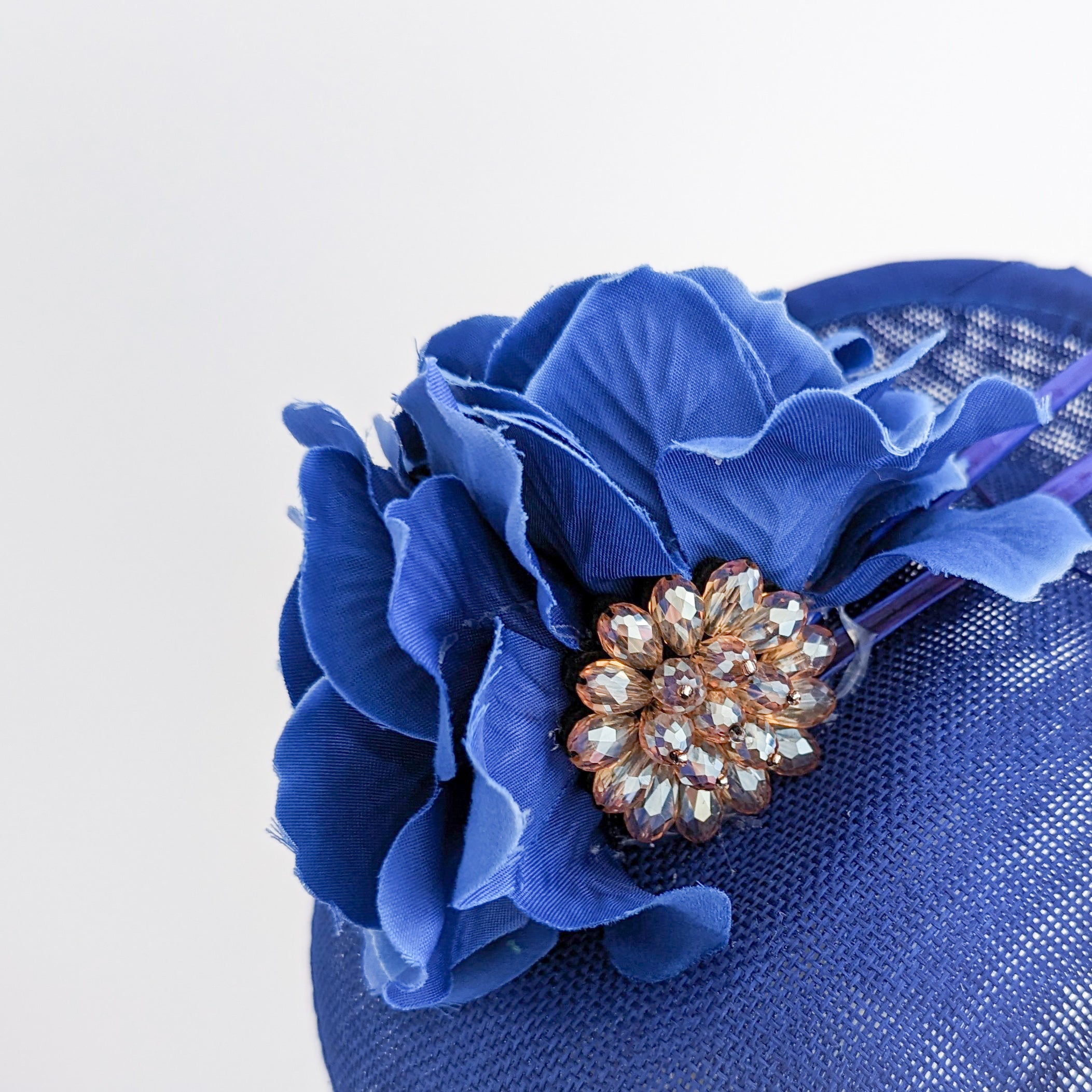 Royal cobalt blue flower disc saucer fascinator hat