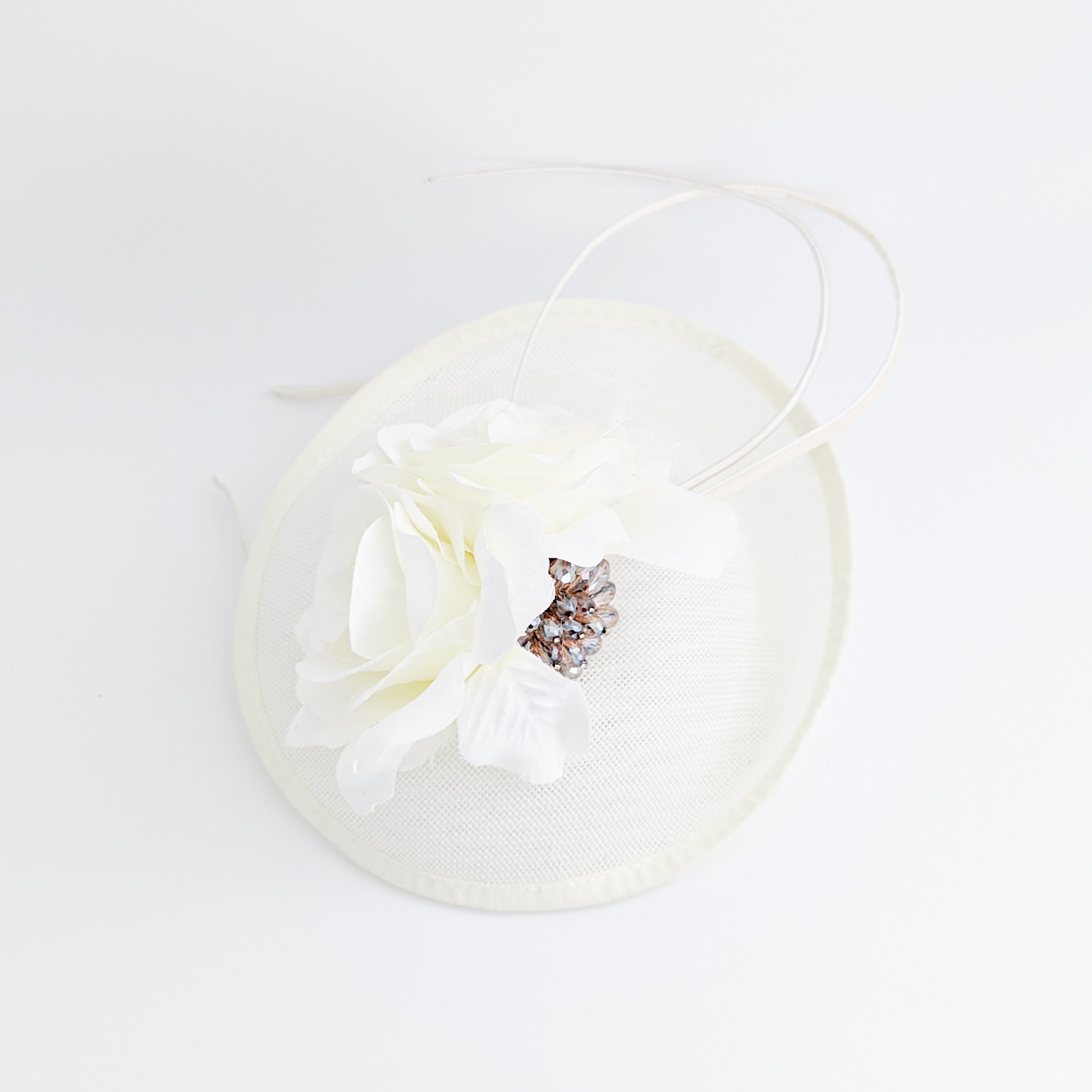 Cream flower disc saucer fascinator hat