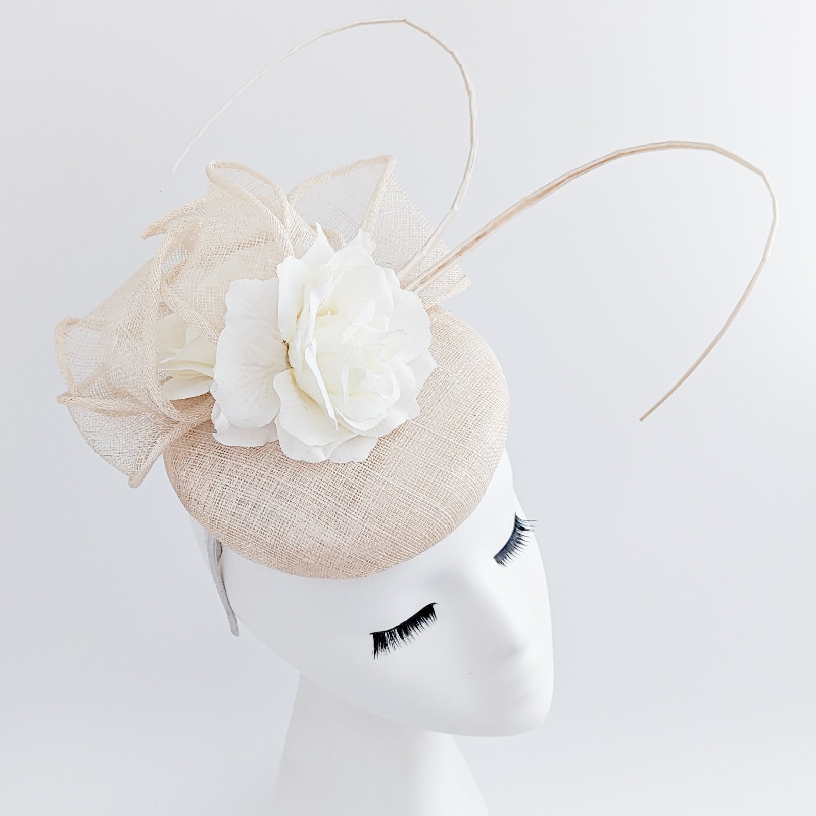 Cream flower fascinator hat