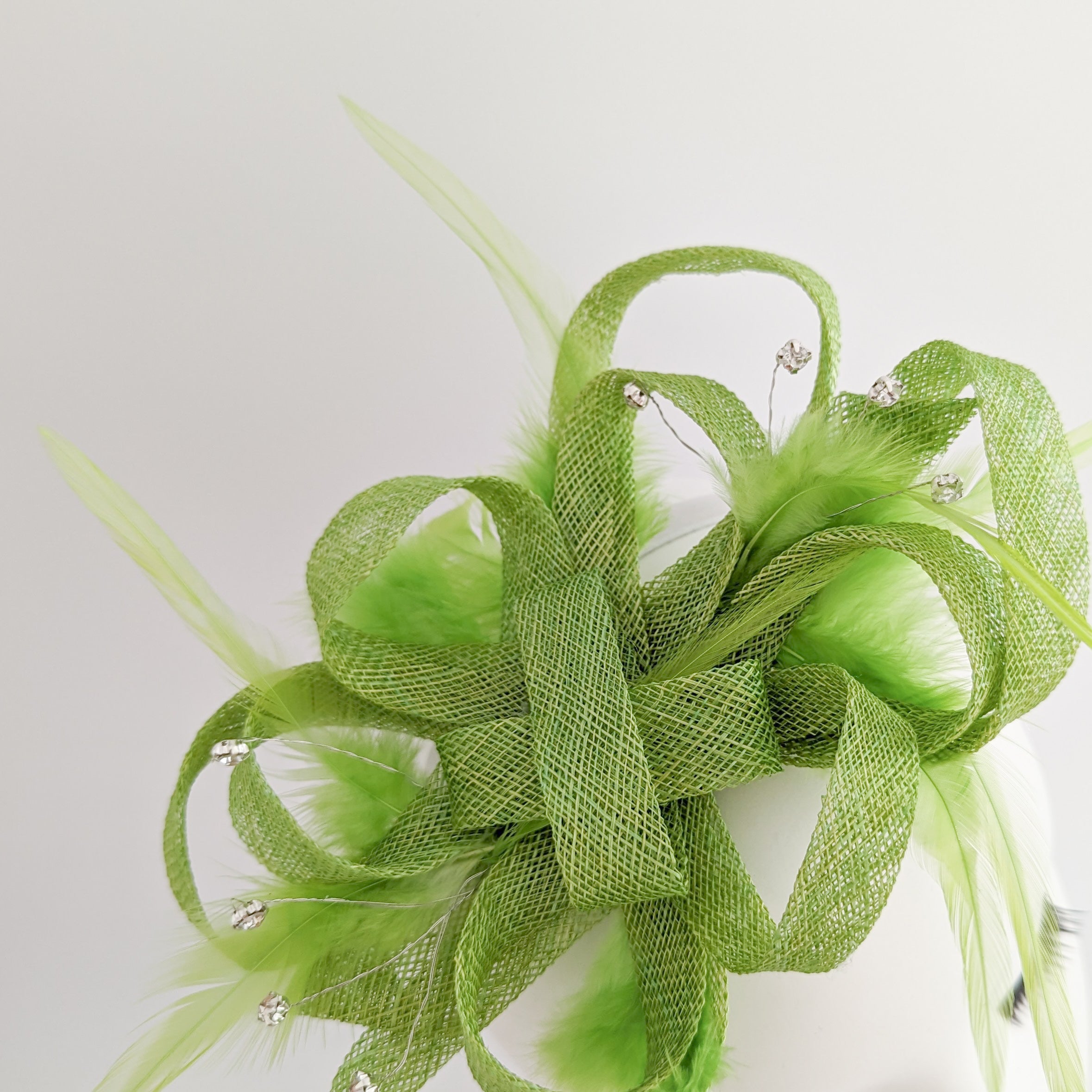 Lime green crystal feather fascinator hat