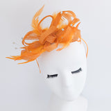 Orange crystal feather fascinator hat