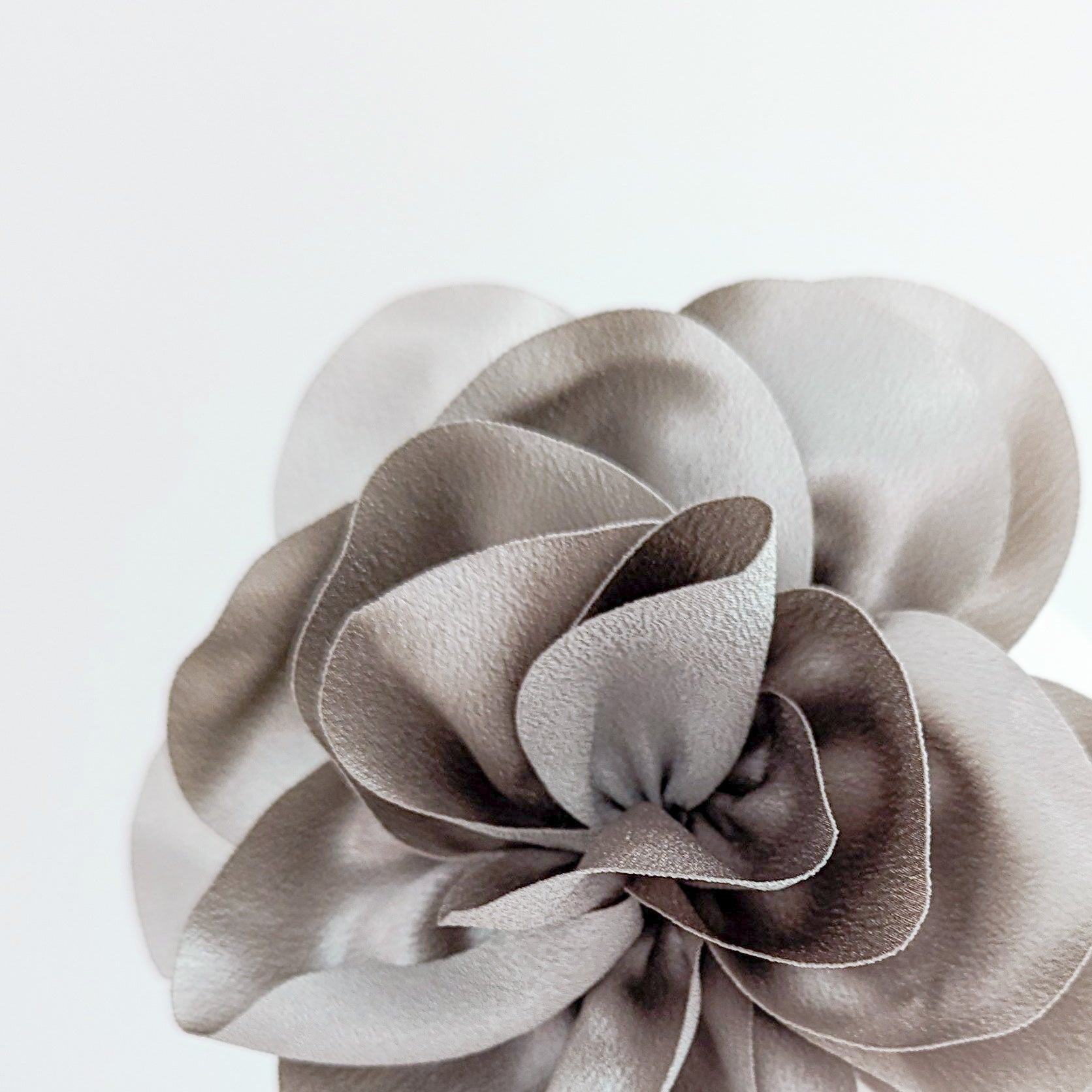 Silver satin rose fascinator hat