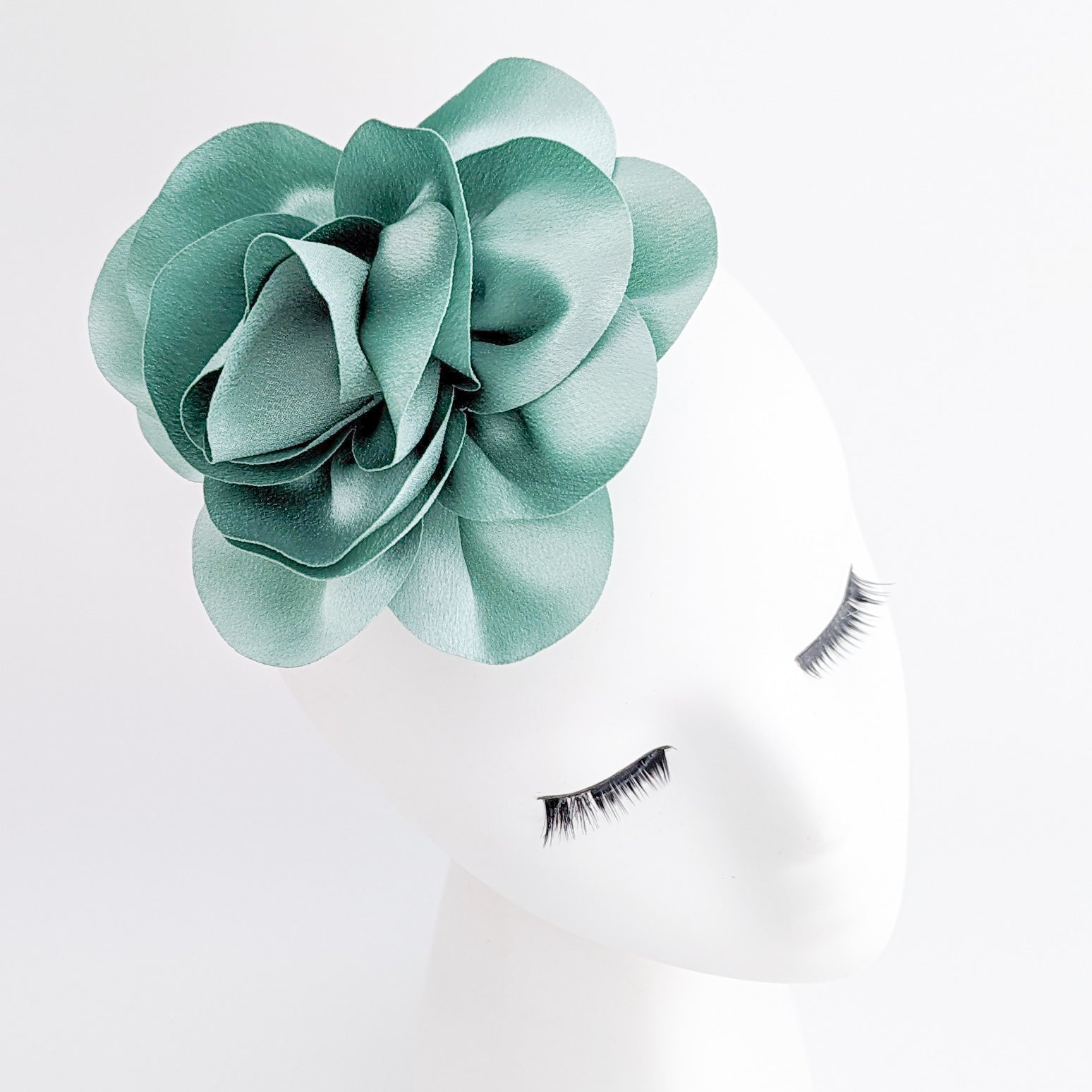 Pastel mint green satin rose fascinator hat