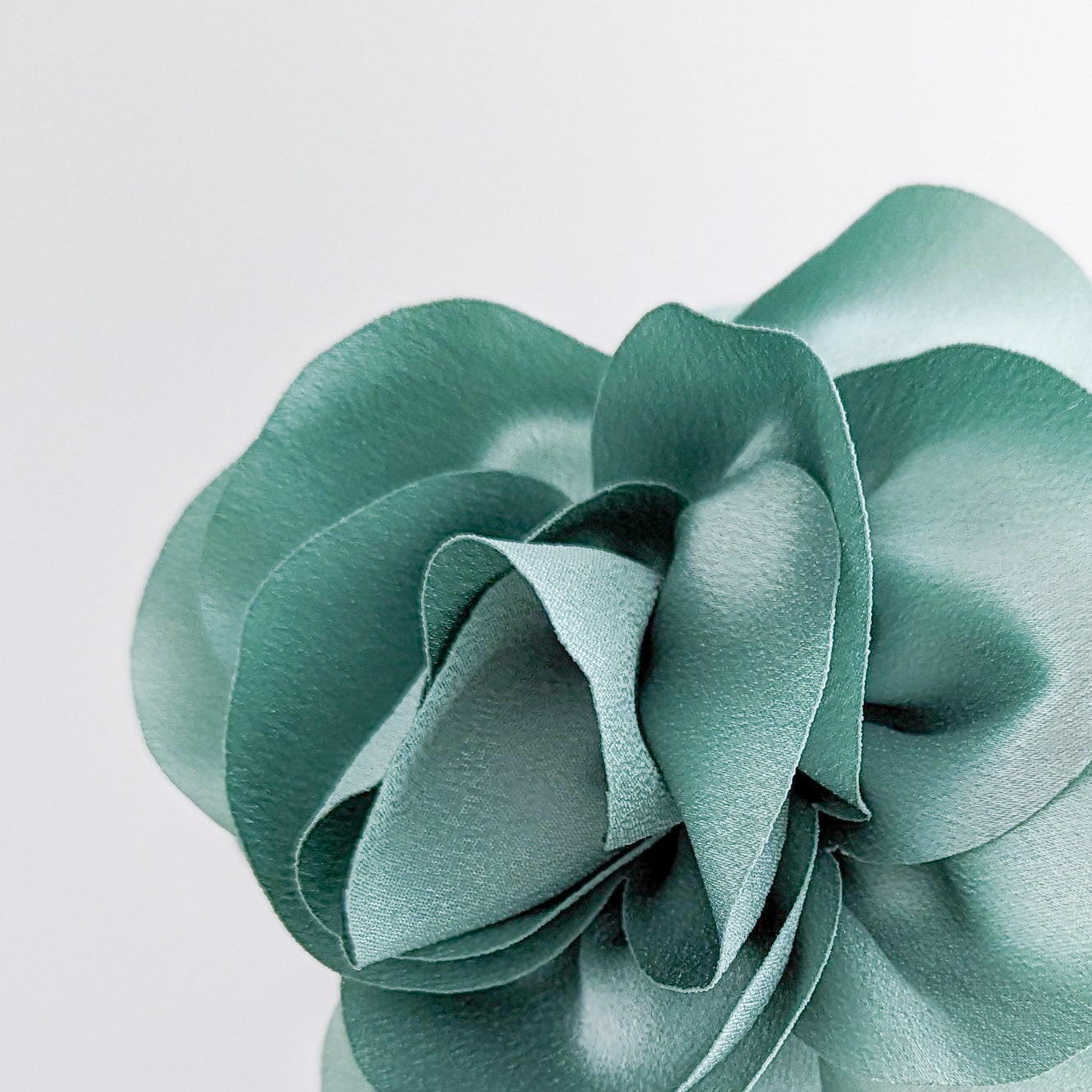 Pastel mint green satin rose fascinator hat