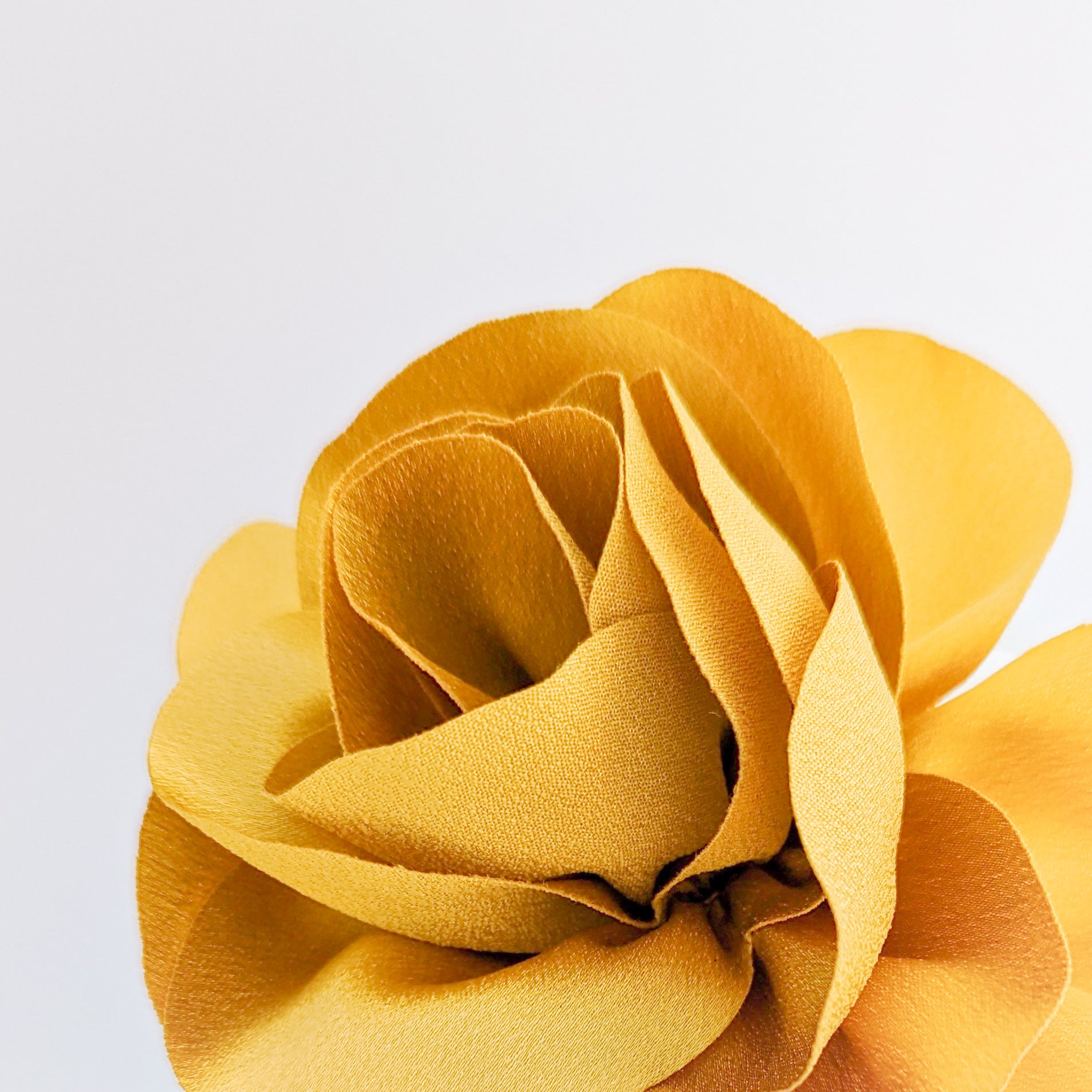 Warm gold satin rose fascinator hat