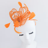 Orange feather fascinator hat