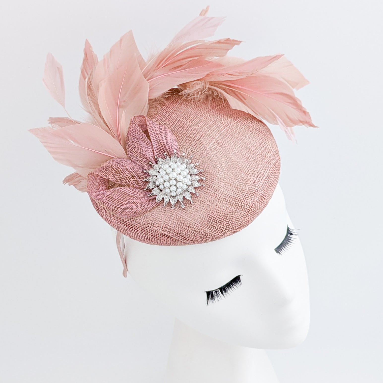 Blush pink feather pearl fascinator hat