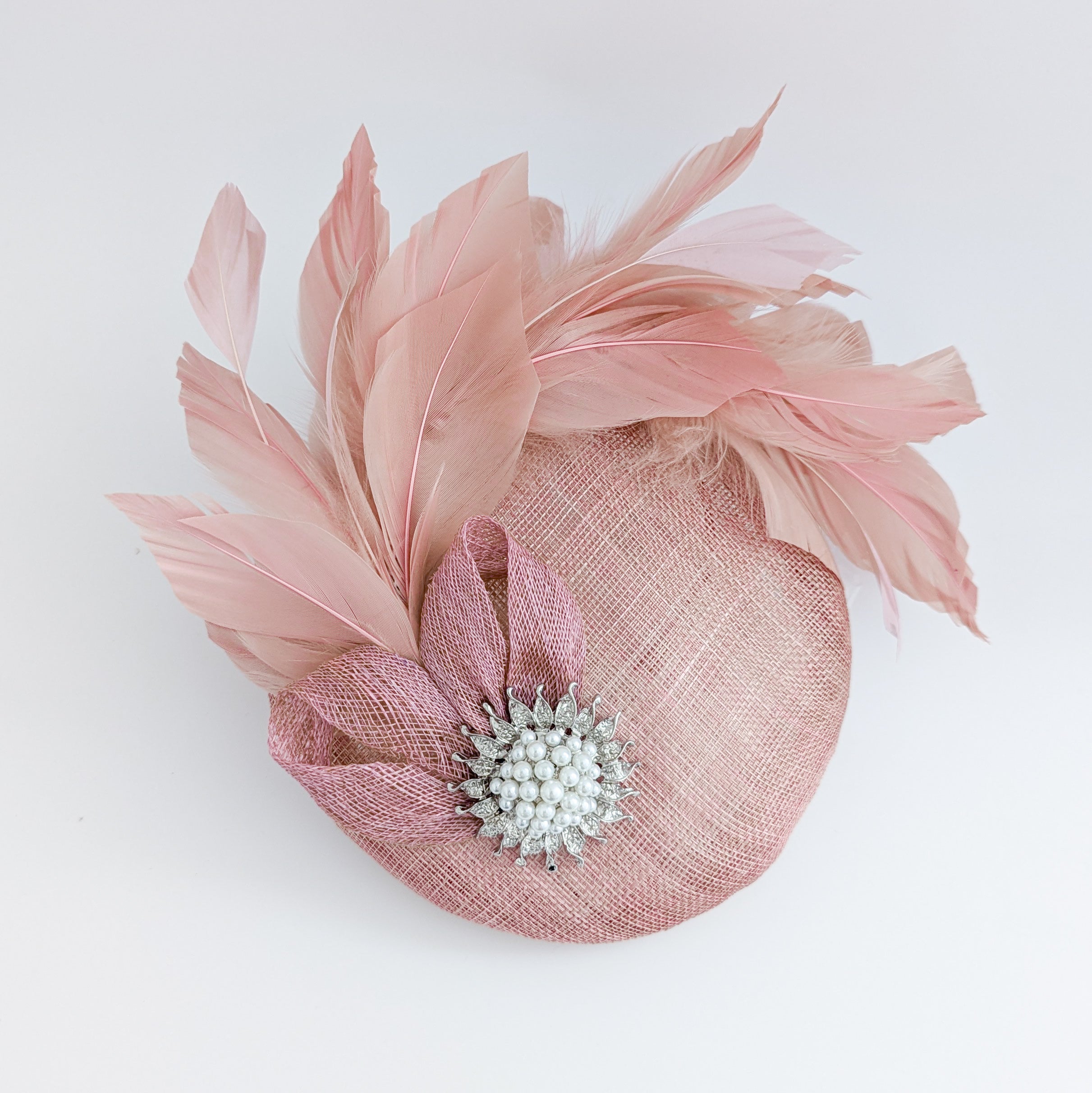 Blush pink feather pearl fascinator hat