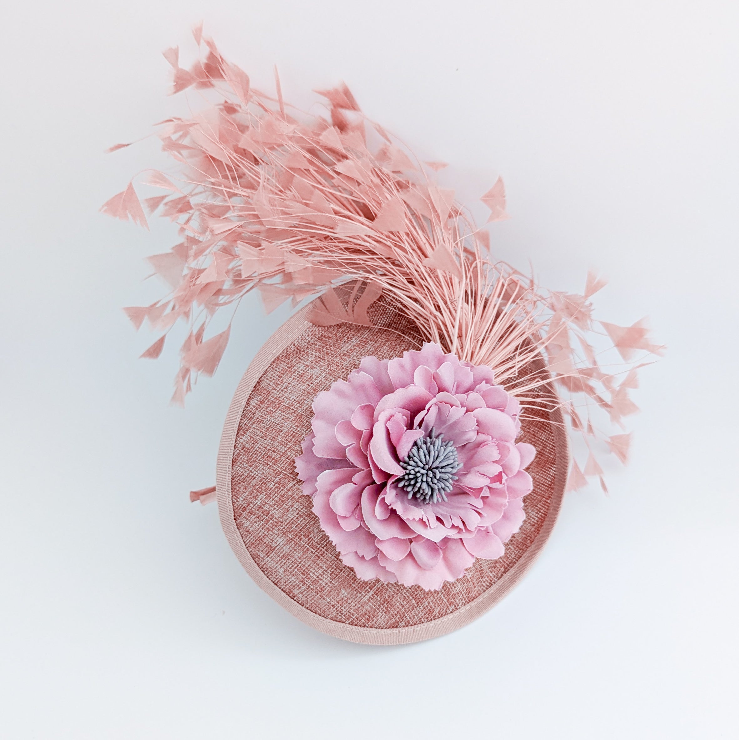 Blush pink flower feather disc saucer fascinator hat