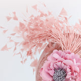 Blush pink flower feather disc saucer fascinator hat