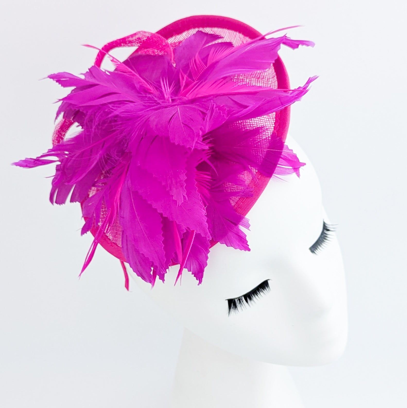 Fuchsia pink feather disc saucer fascinator hat