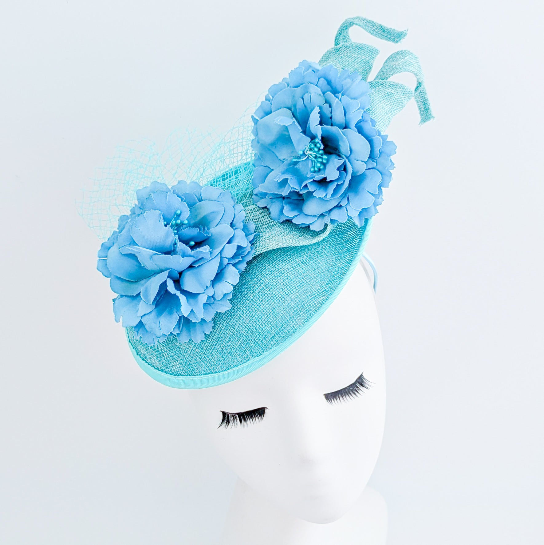 Seafoam mint green flower fascinator disc saucer hat
