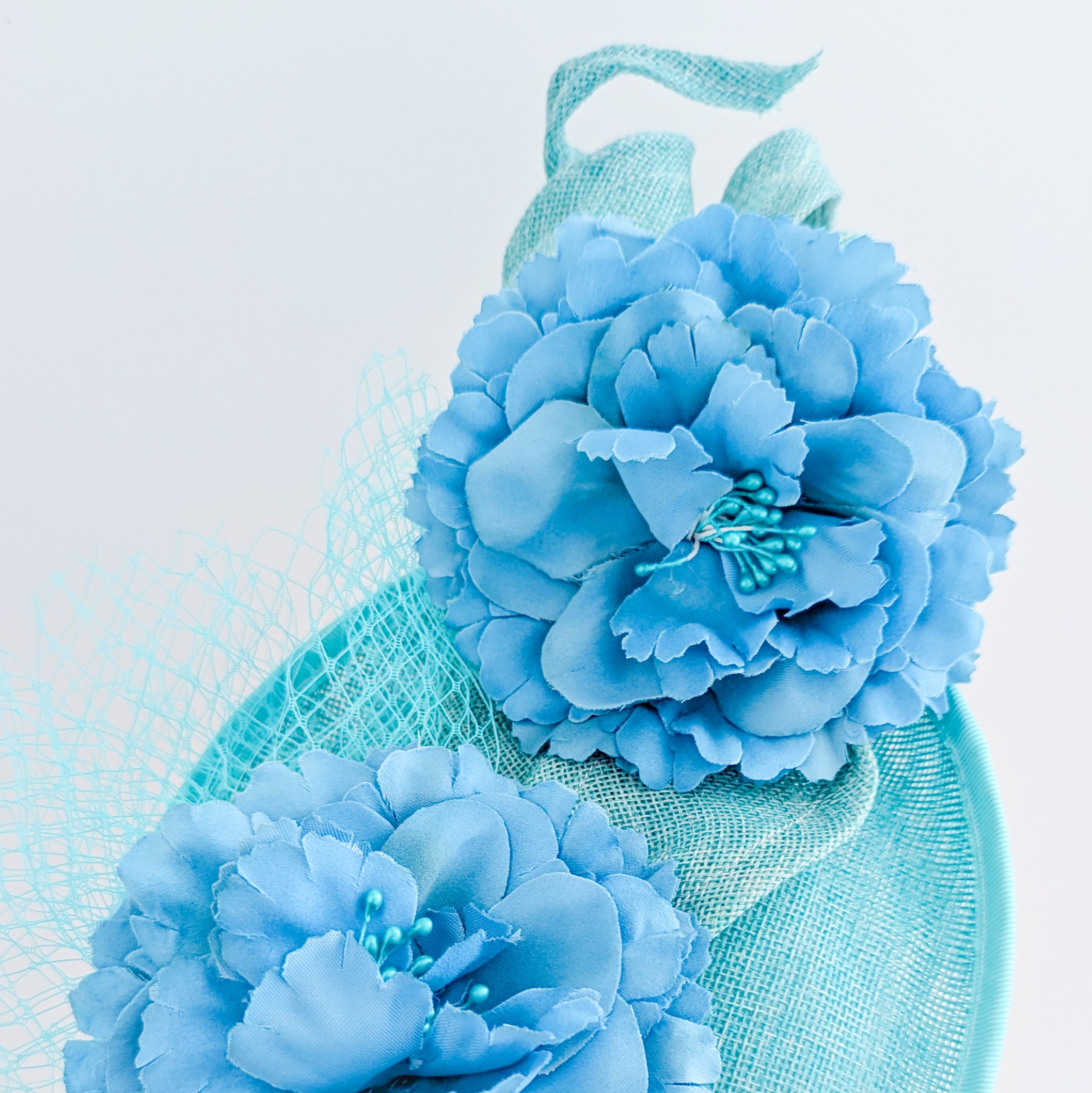 Seafoam mint green flower fascinator disc saucer hat