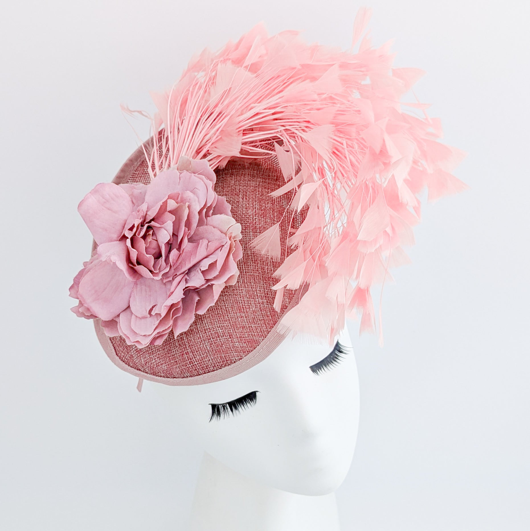 Blush pink flower feather disc saucer fascinator hat