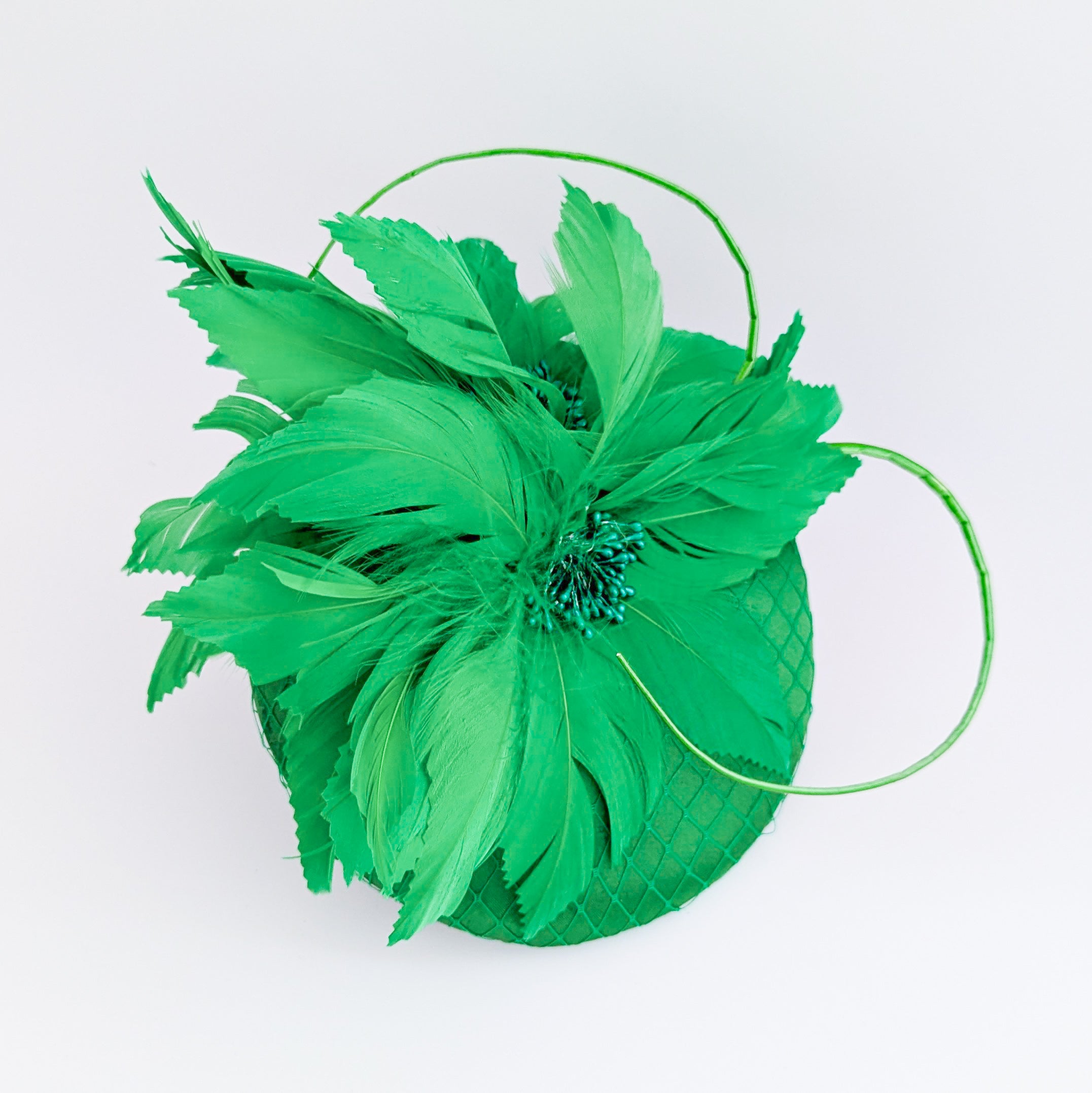 Shamrock green feather satin fascinator hat