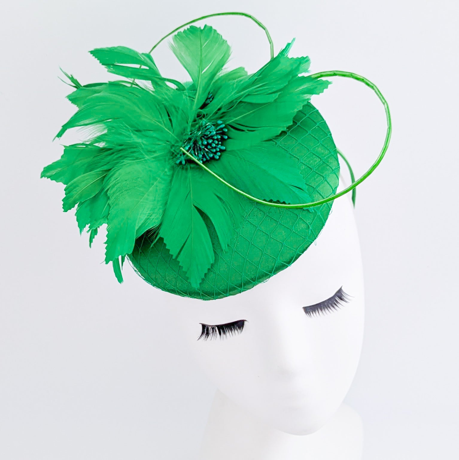 Shamrock green feather satin fascinator hat