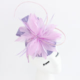 Cappello fascinator con piume di corallo