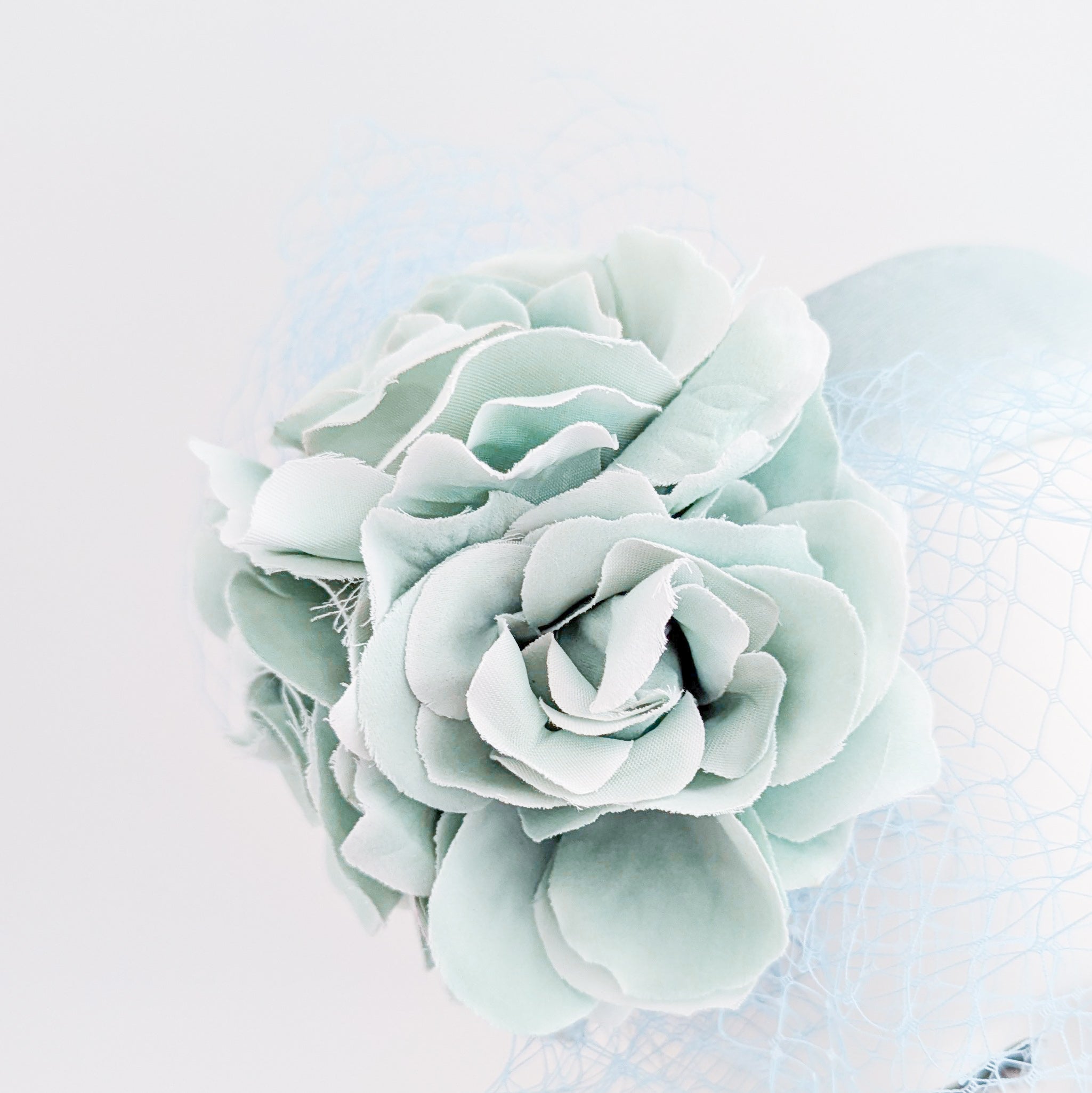 Aquamarine blue flower padded velvet headband fascinator