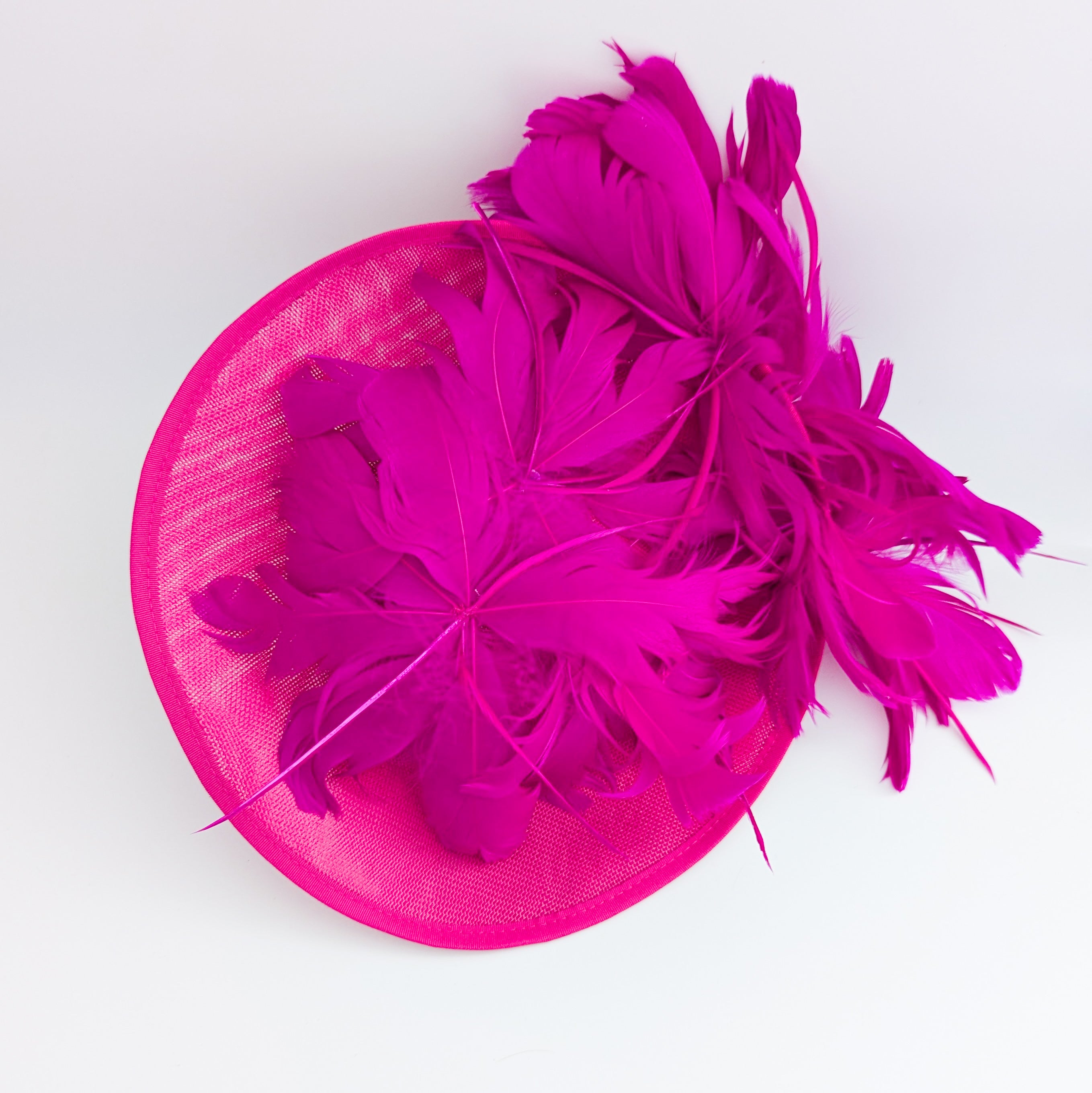 Fuchsia pink large feather saucer disc fascinator hat