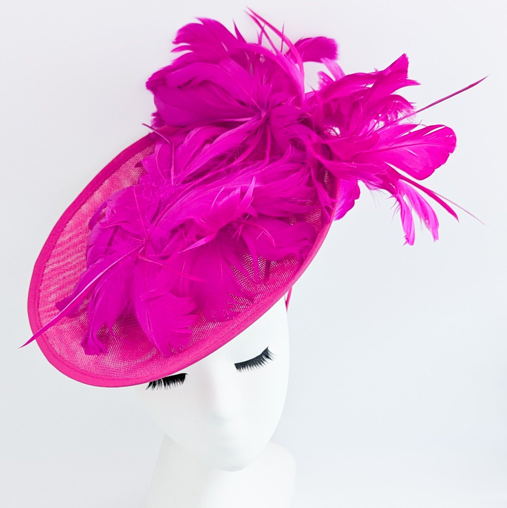 Fuchsia pink large feather saucer disc fascinator hat