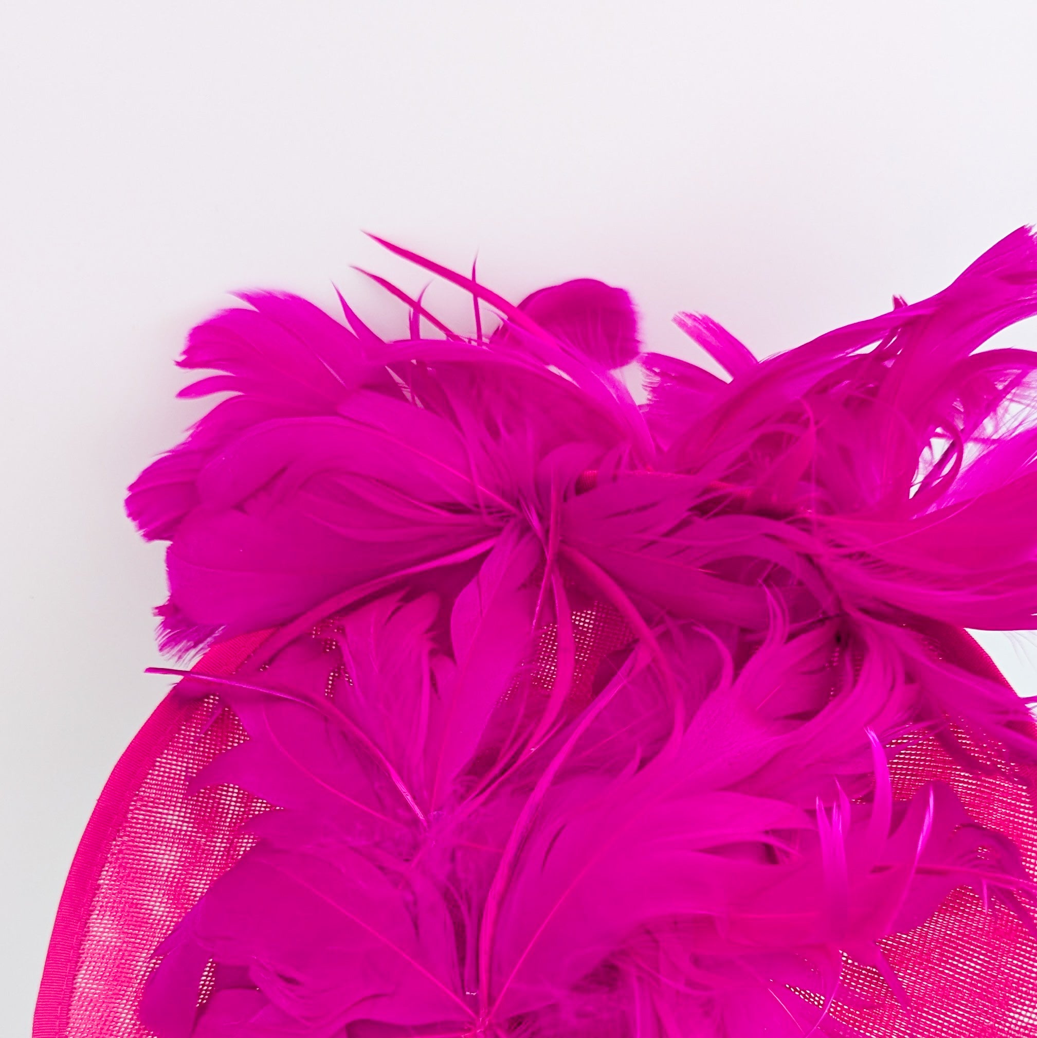 Fuchsia pink large feather saucer disc fascinator hat