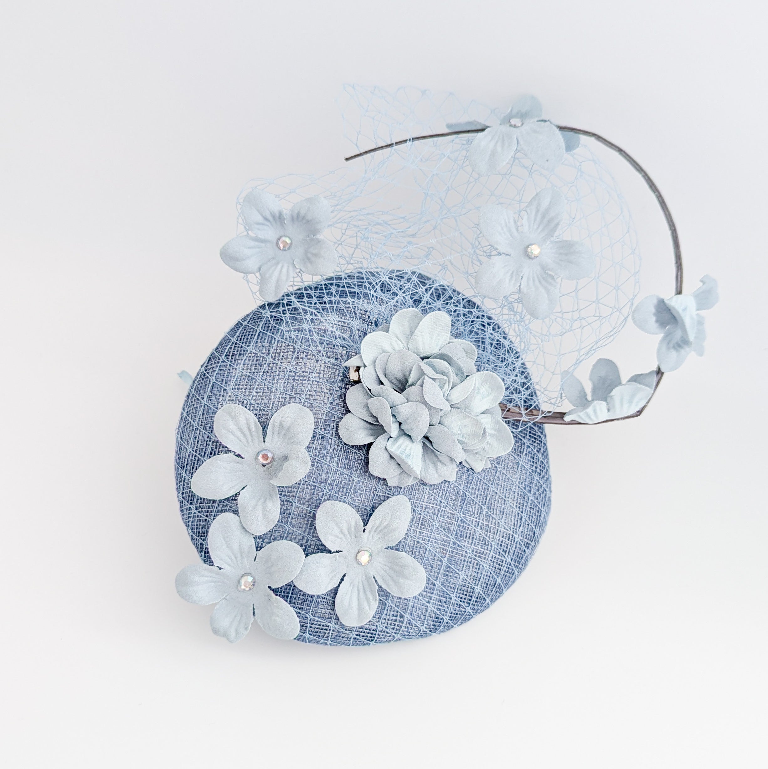 Cappello fascinator fiore verde acquamarina