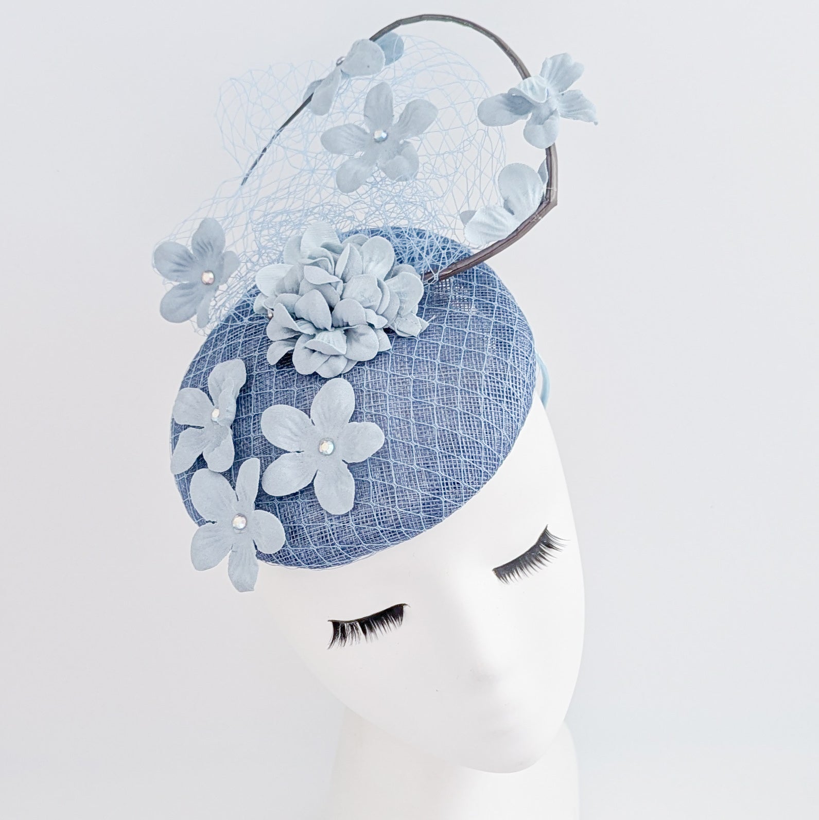 Cappello fascinator fiore verde acquamarina