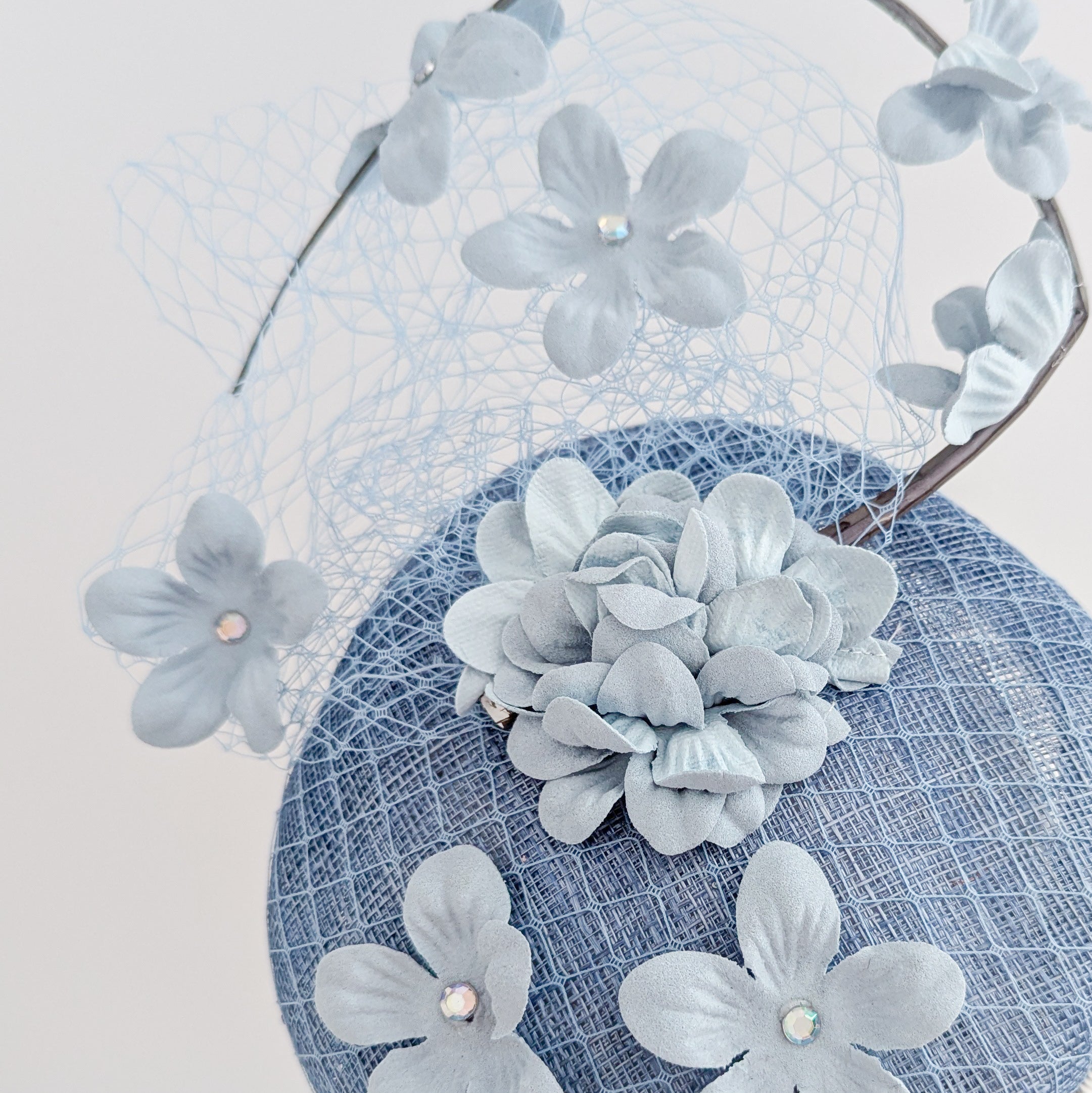 Cappello fascinator fiore verde acquamarina