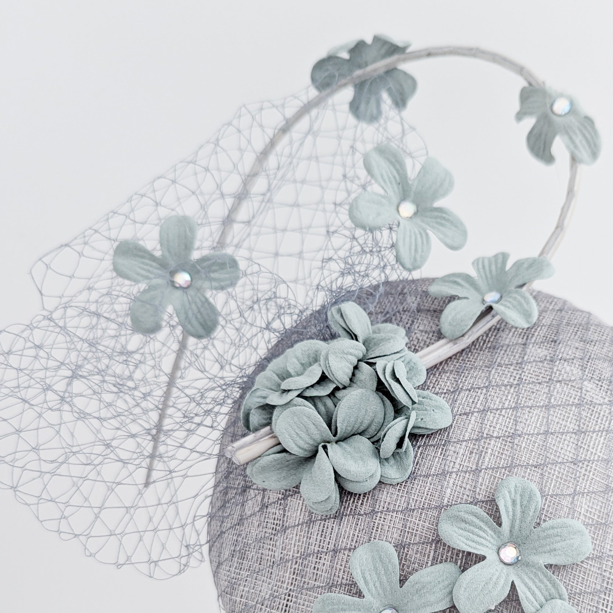 Aquamarine grey blue flower fascinator hat