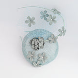 Cappello fascinator fiore verde acquamarina
