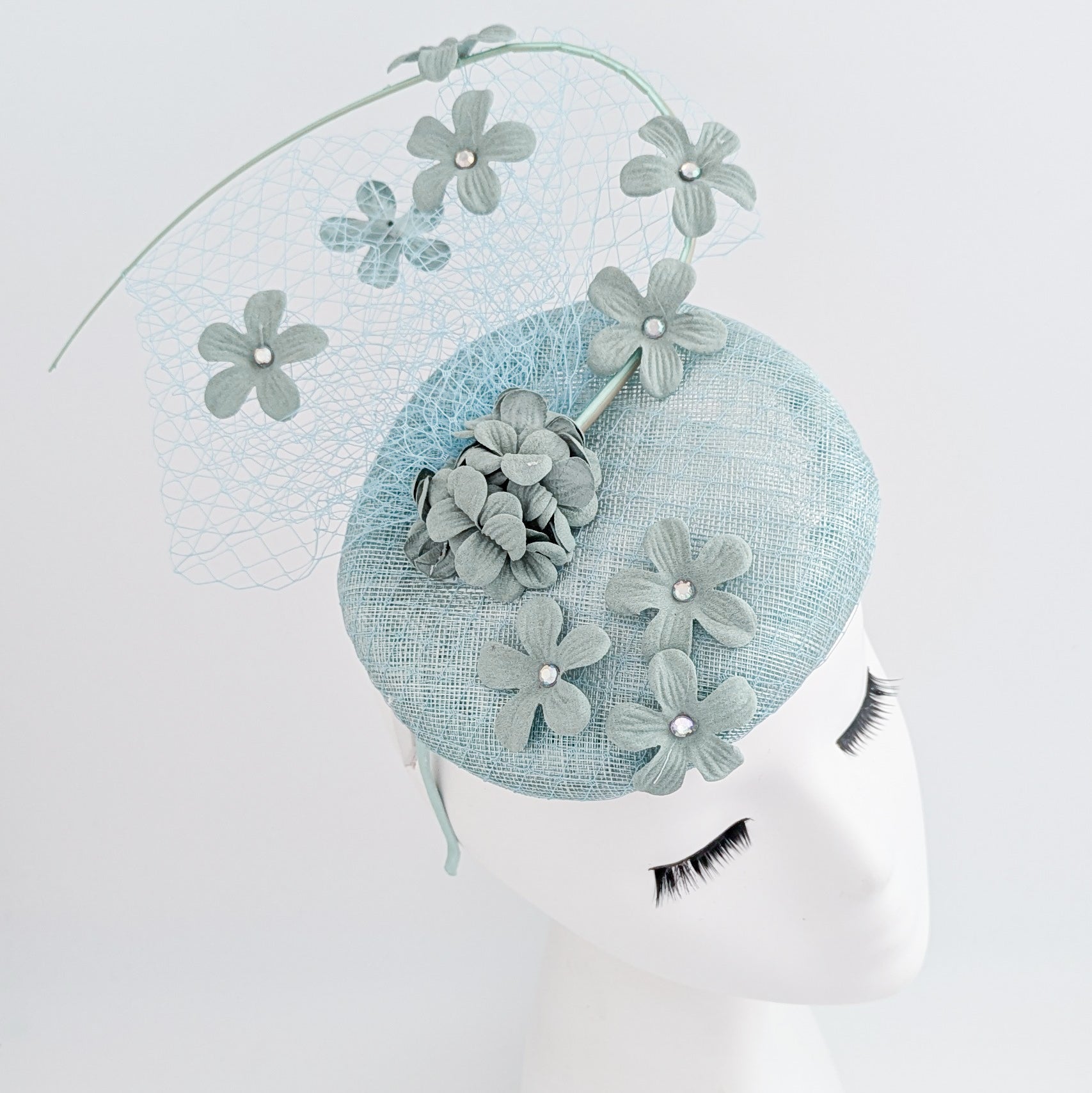 Cappello fascinator fiore verde acquamarina