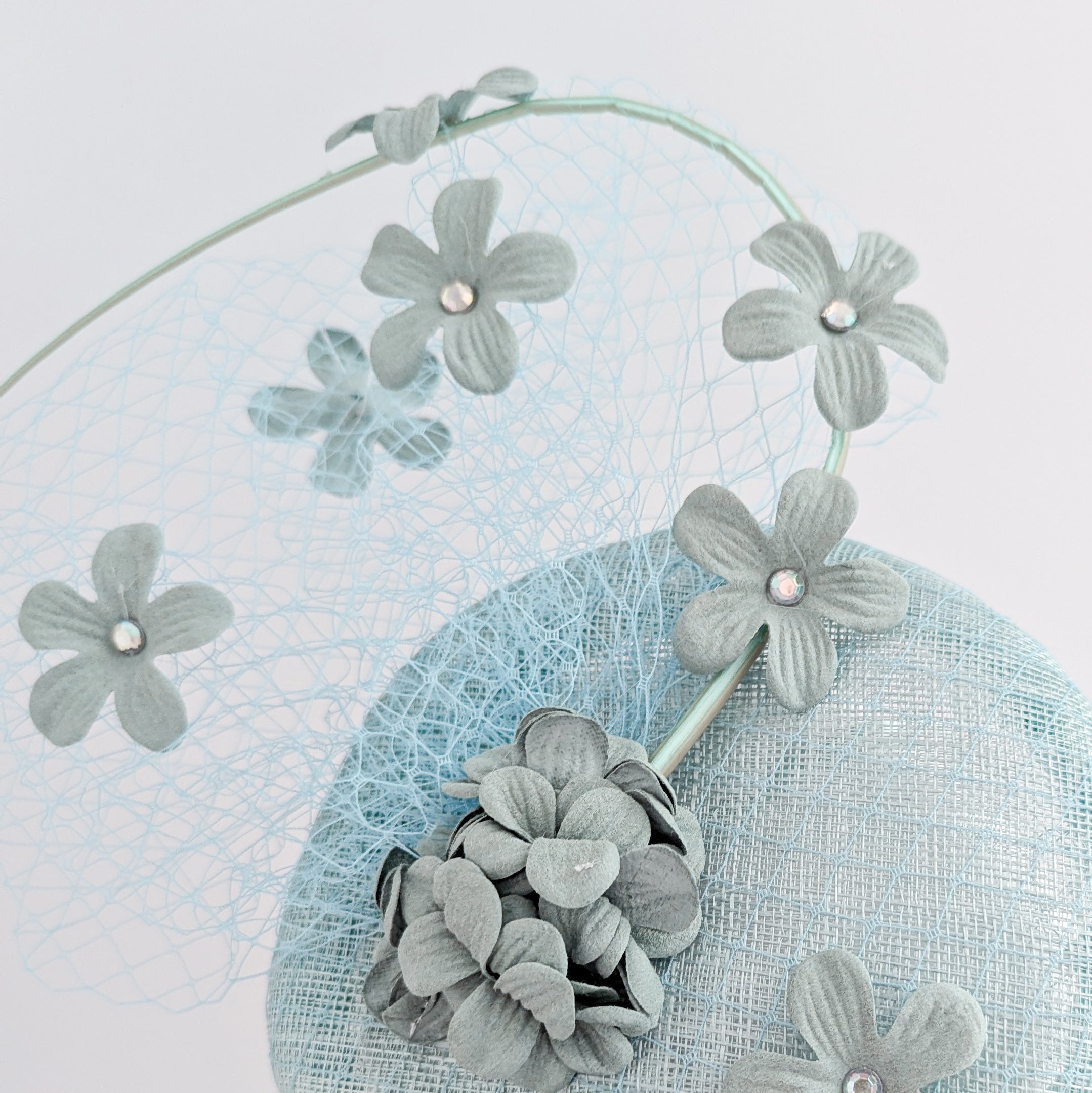 Cappello fascinator fiore verde acquamarina