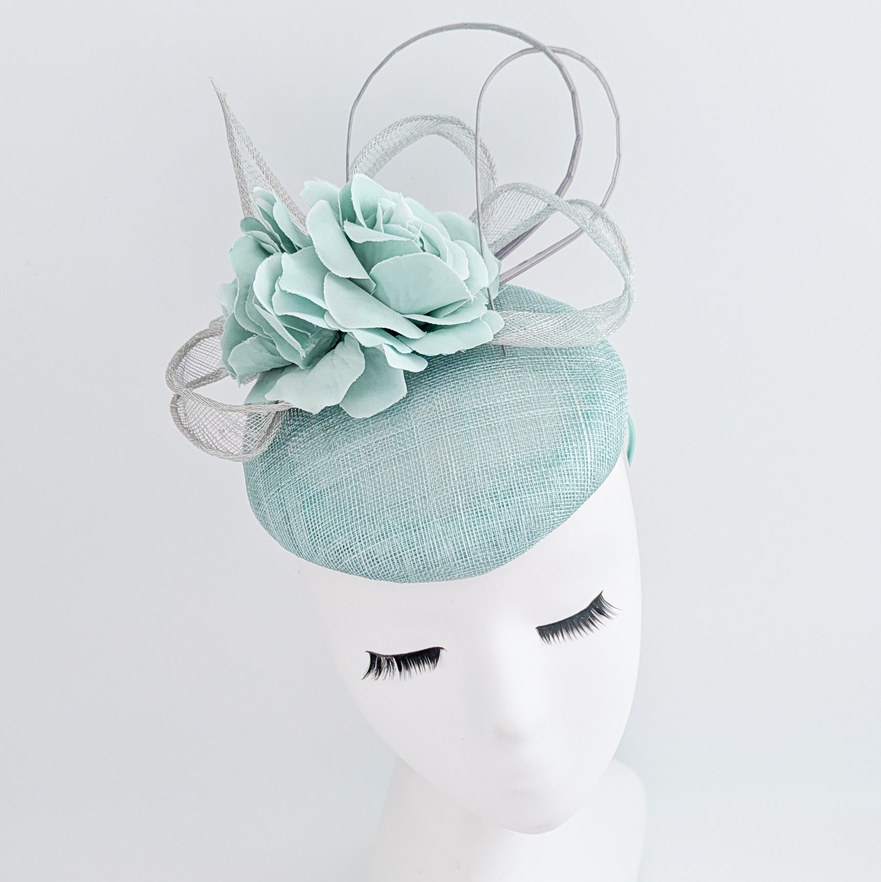 Aquamarine blue flower fascinator hat