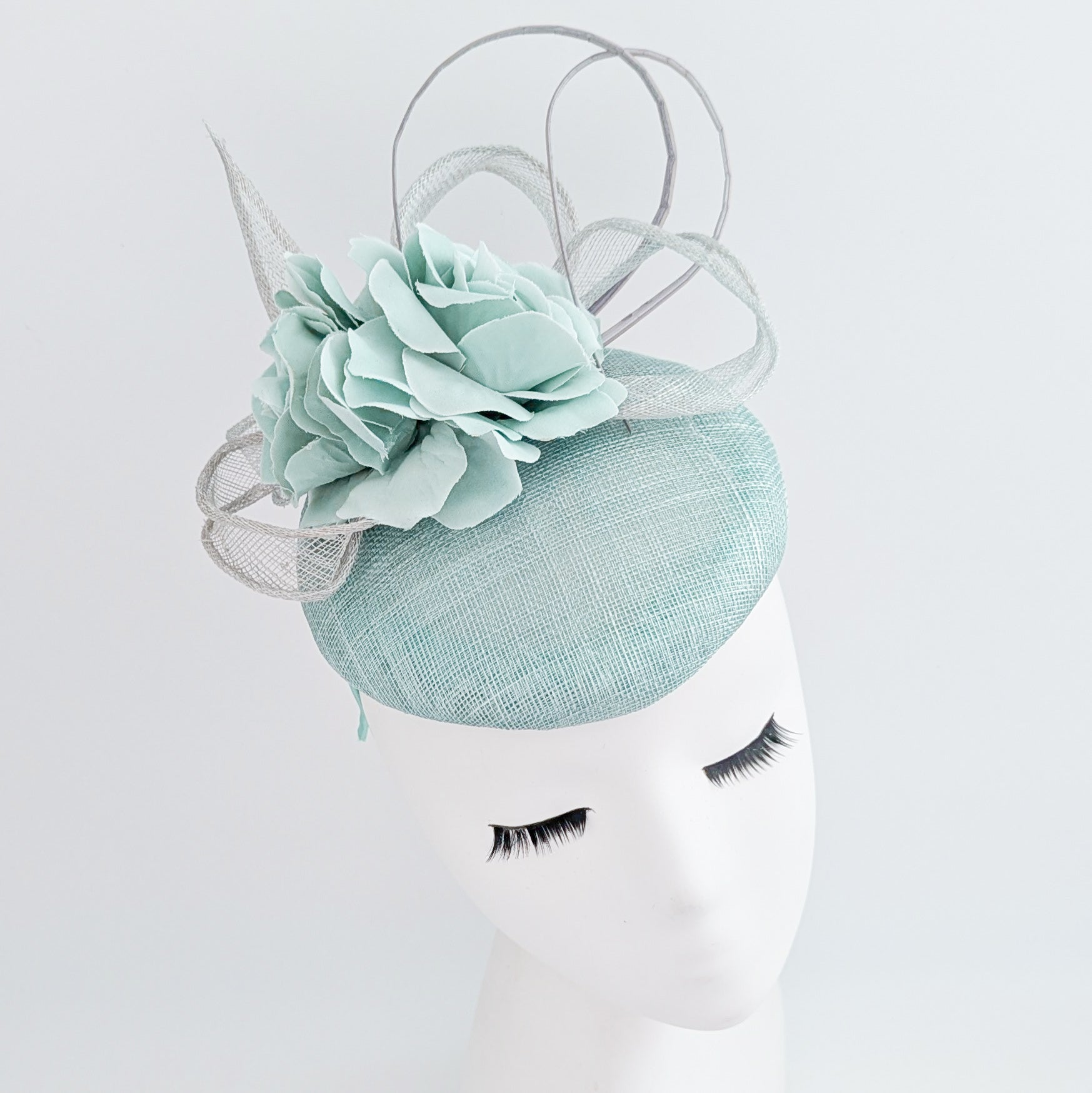 Aquamarine blue flower fascinator hat