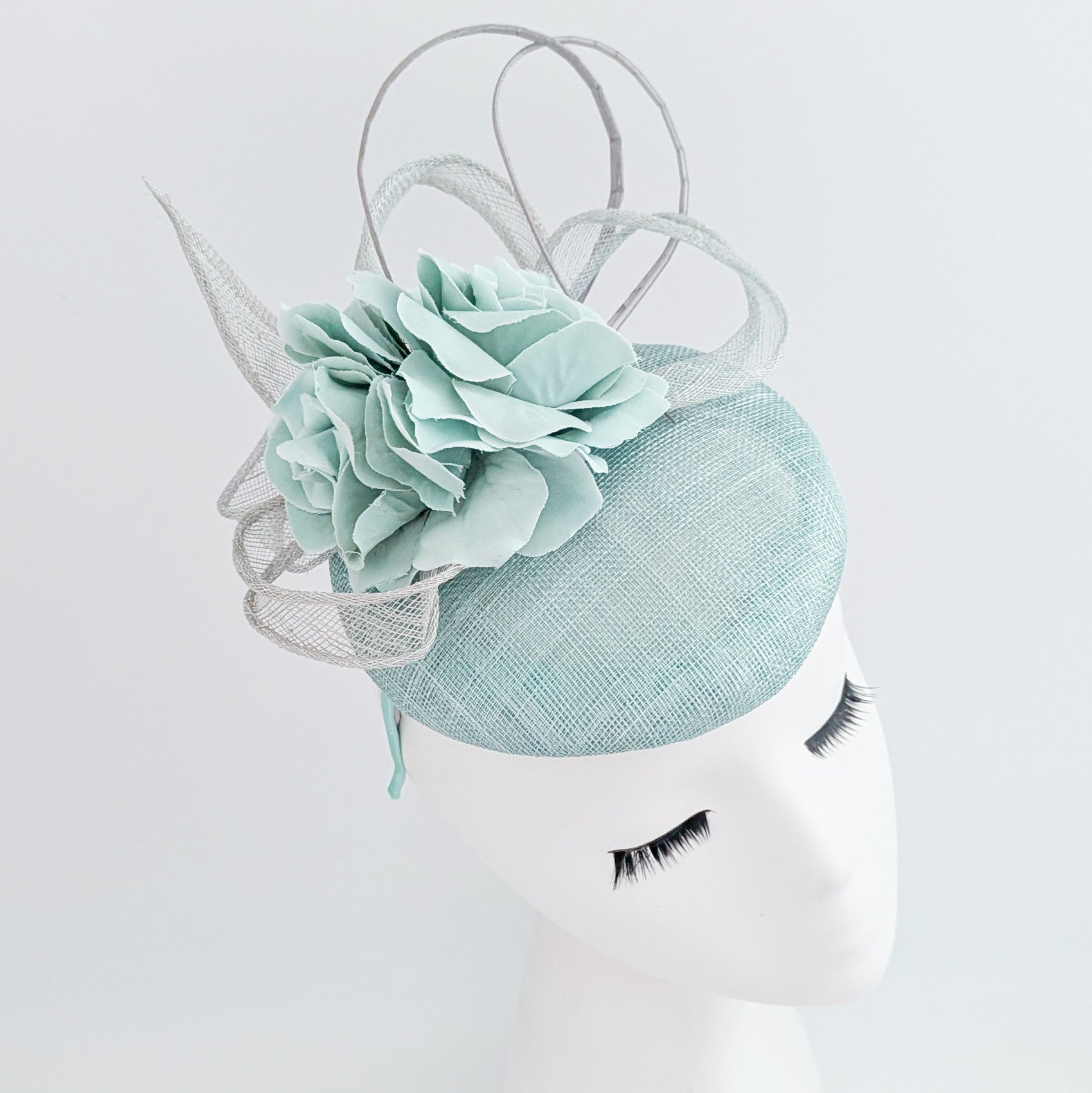 Aquamarine blue flower fascinator hat