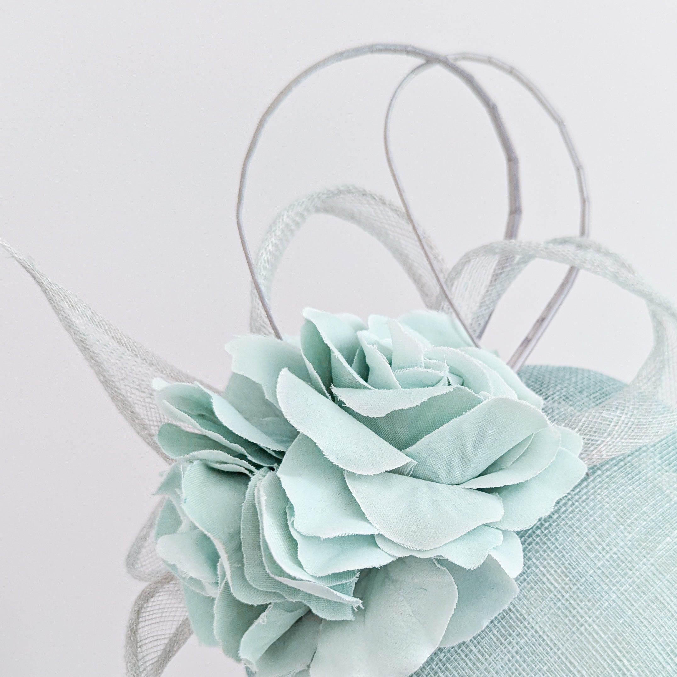 Aquamarine blue flower fascinator hat