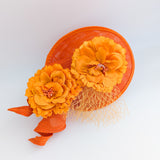 Orange flower fascinator disc saucer hat