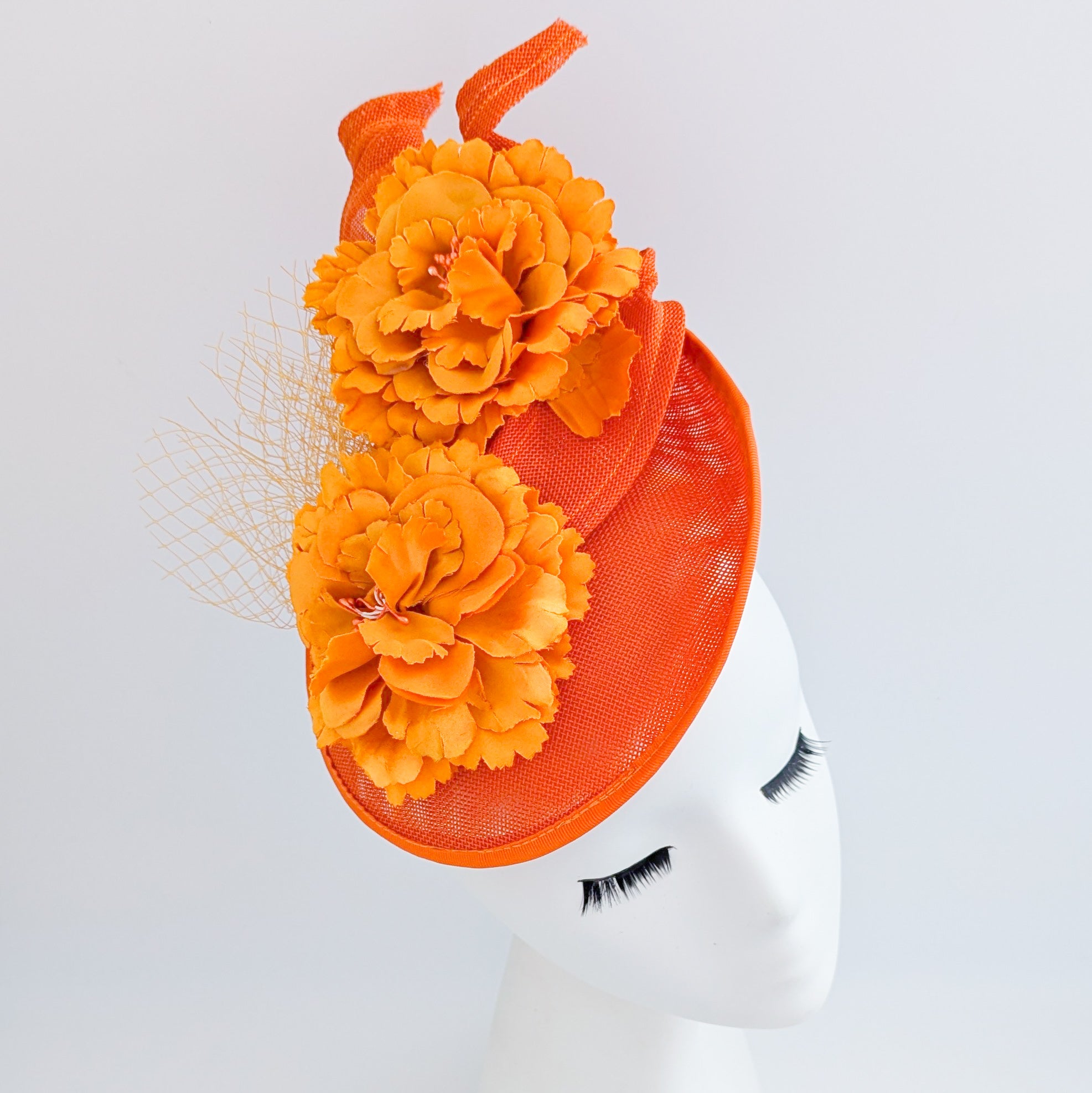 Orange flower fascinator disc saucer hat