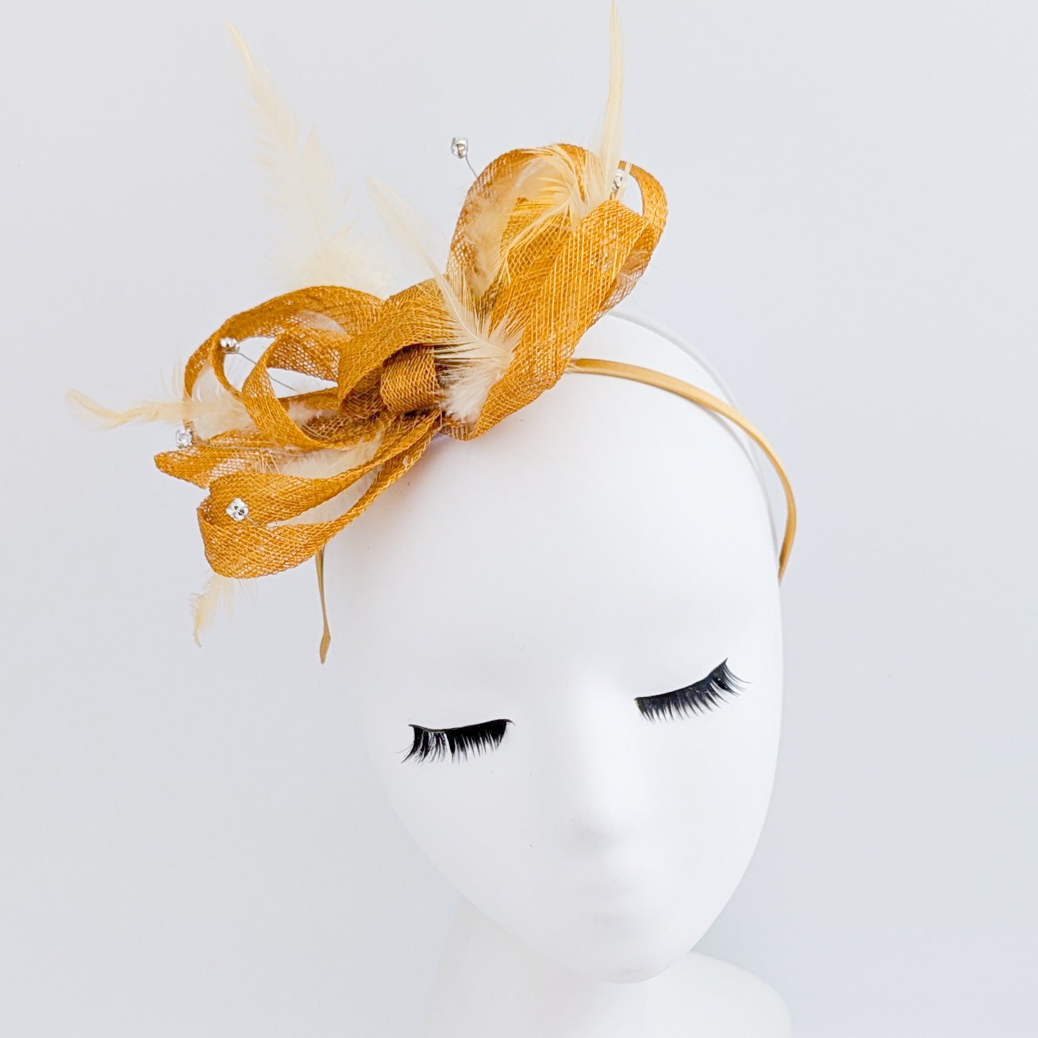 Golden yellow crystal feather fascinator hat
