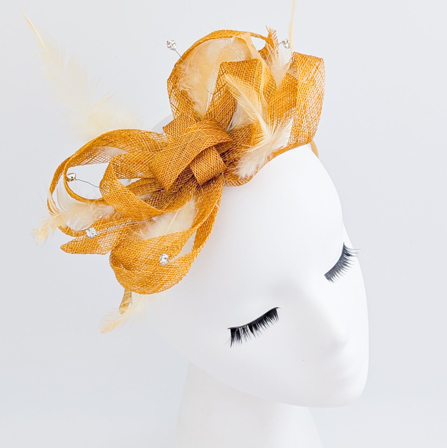 Golden yellow crystal feather fascinator hat