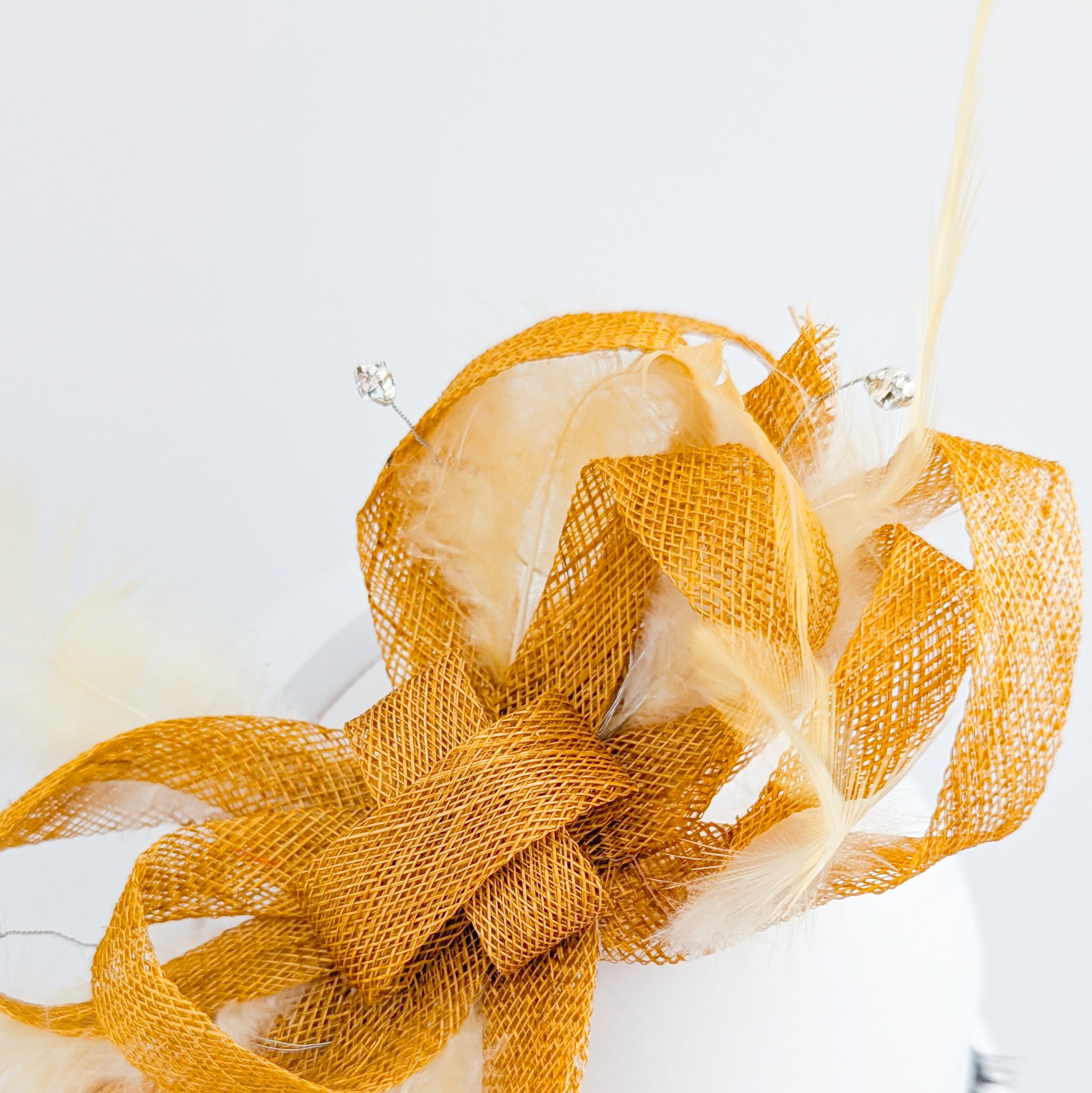 Golden yellow crystal feather fascinator hat