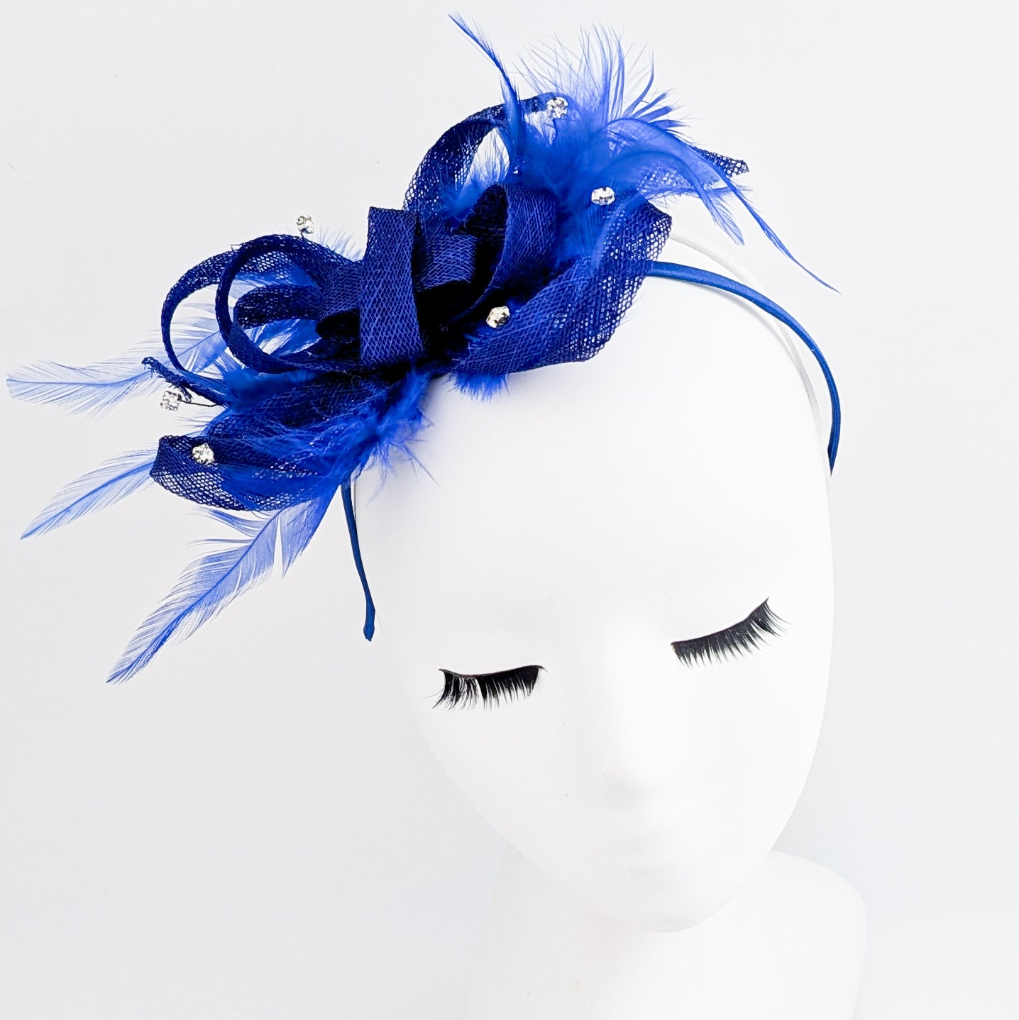 Royal cobalt blue crystal feather fascinator hat