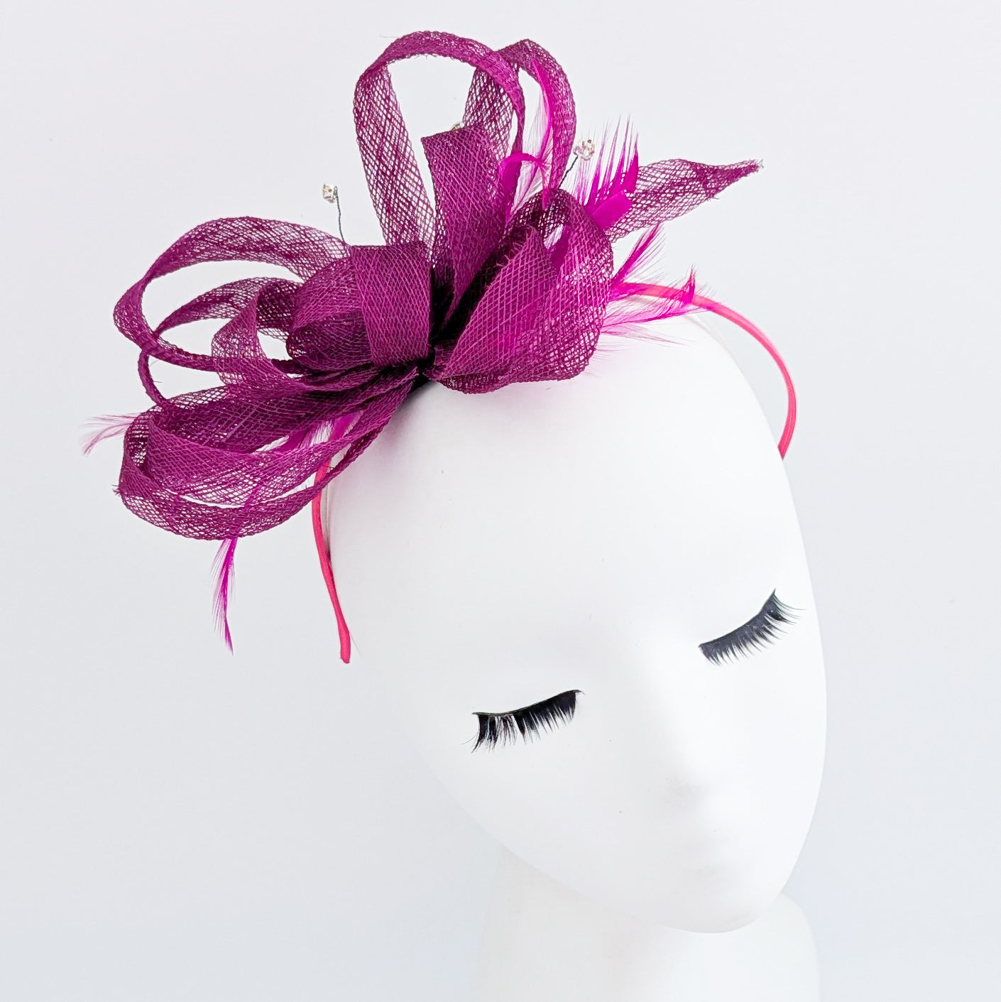 Magenta pink crystal feather fascinator hat