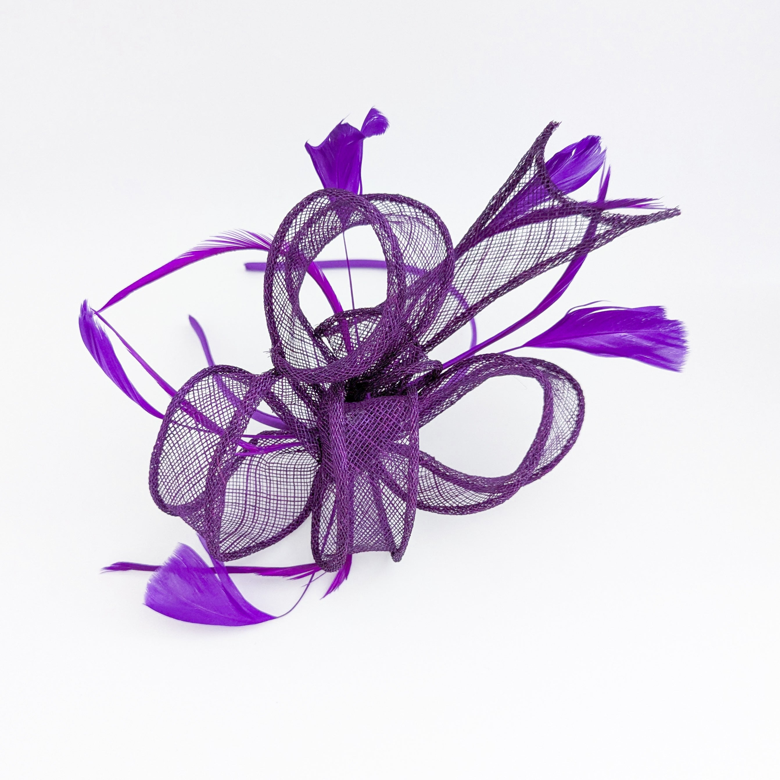 Aubergine cadbury purple feather fascinator hat