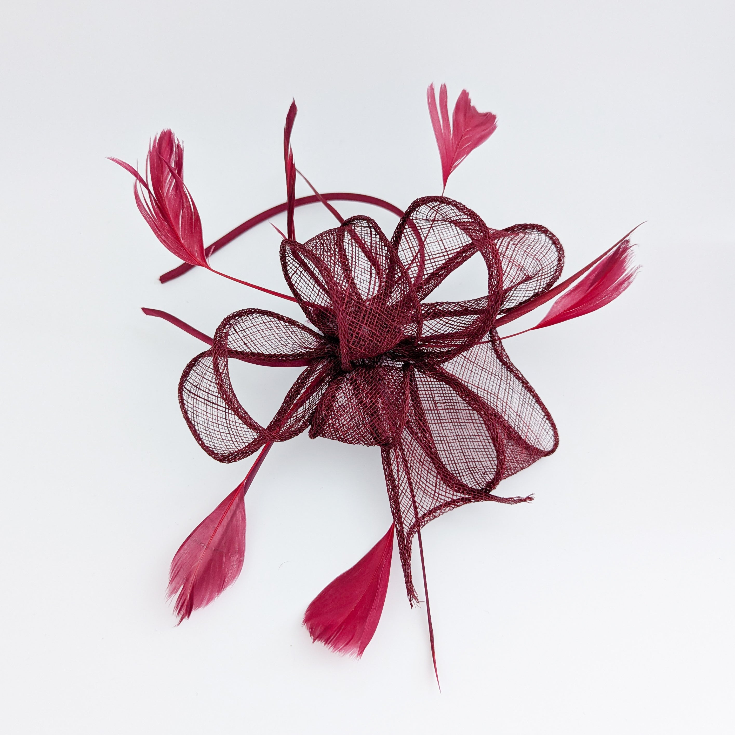 Burgundy feather fascinator hat