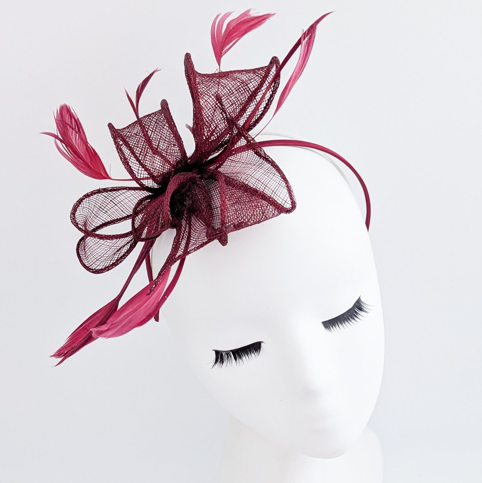 Burgundy feather fascinator hat