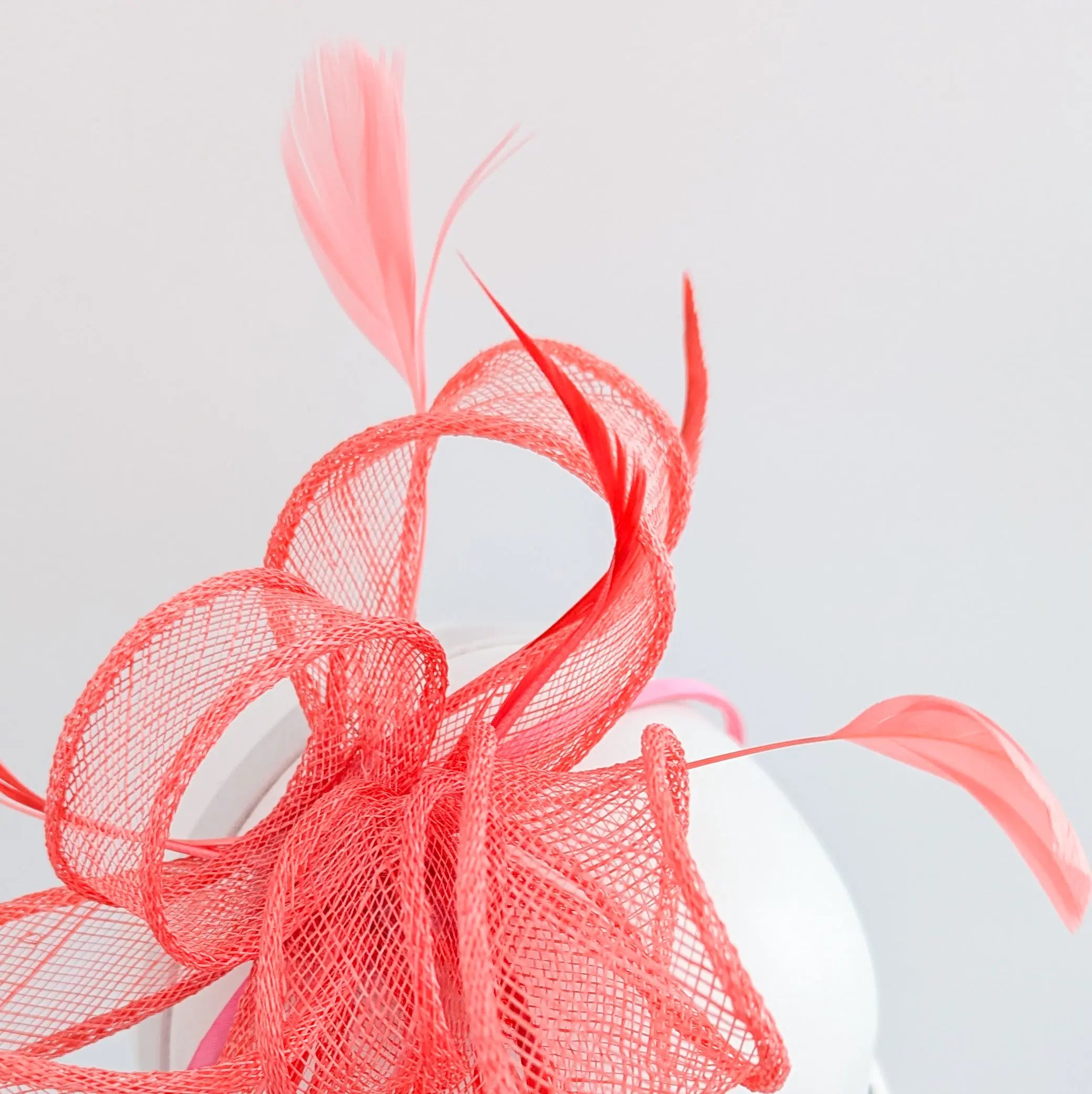 Watermelon coral feather fascinator hat House of Hats