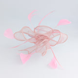 Light peach pink feather fascinator hat